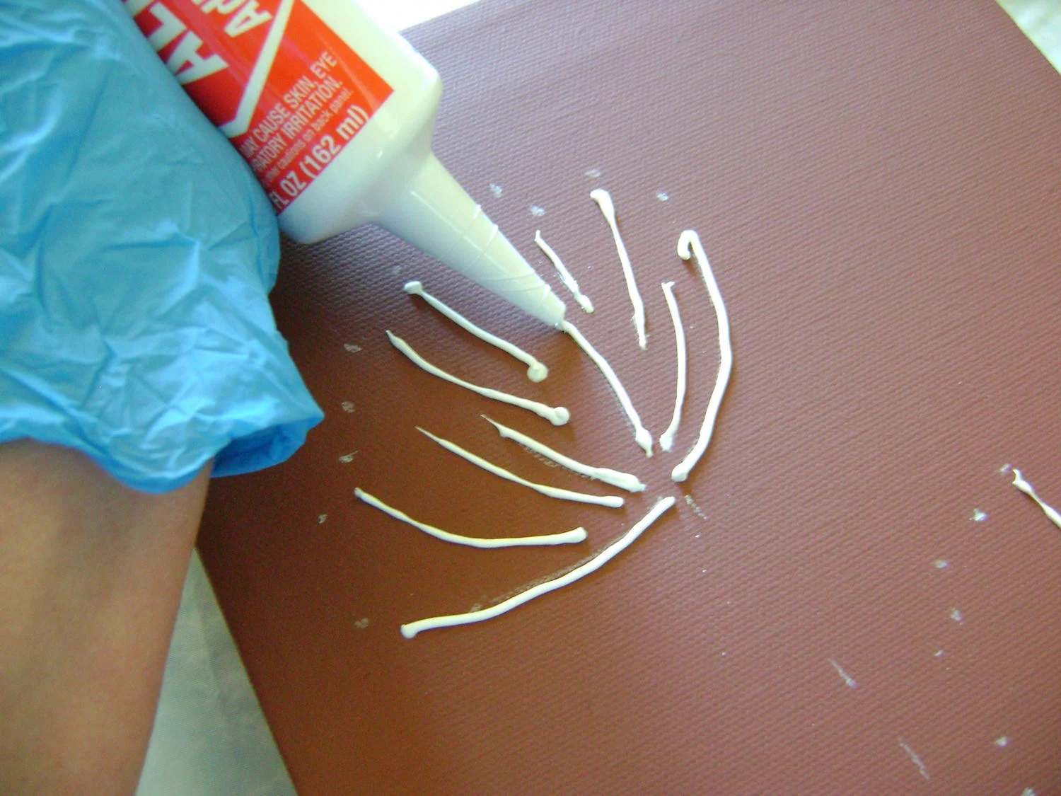 step 8 - Follow the markings you created with chalk, covering the fine lines with caulking.
