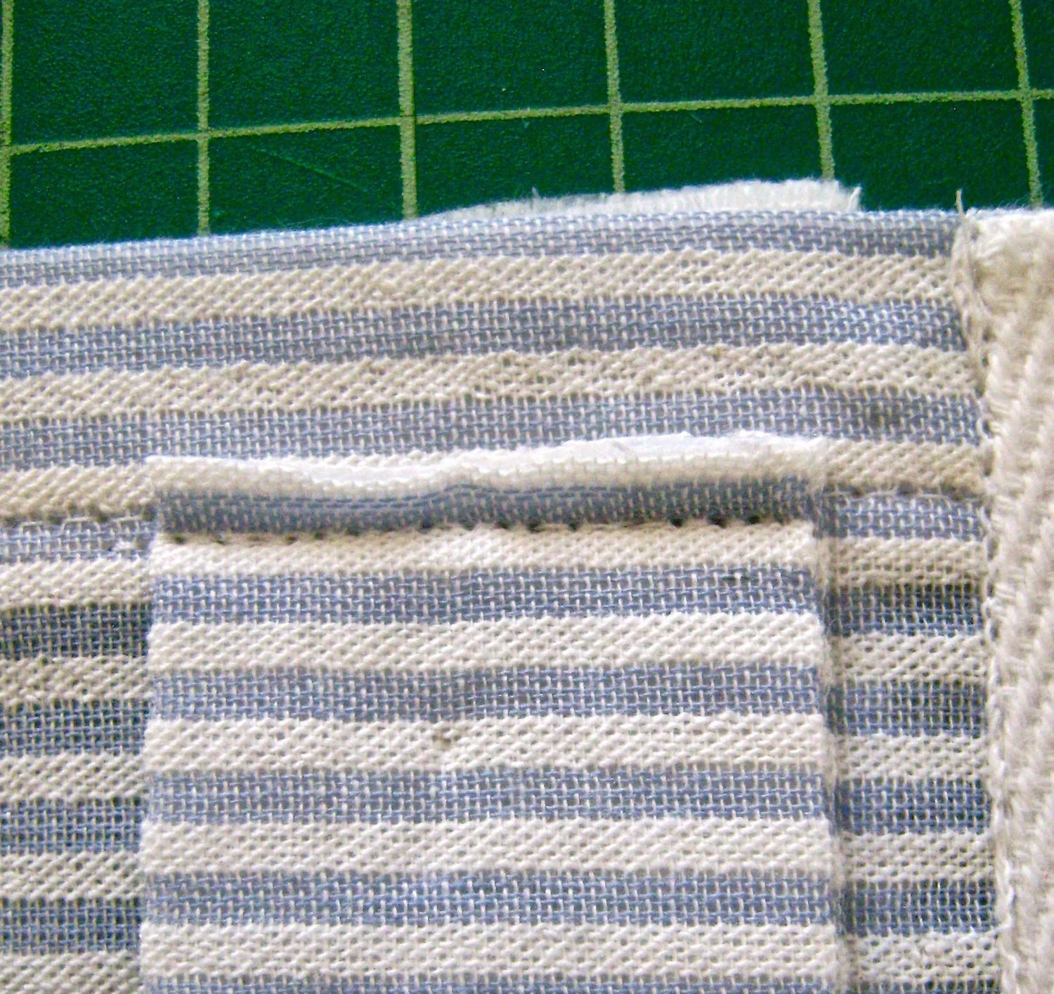 step 15 - Trim the raw edges to 1/8”.