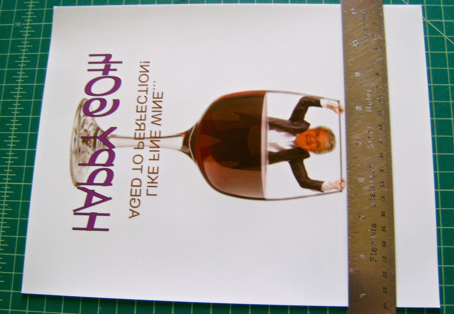 step 3 - With a craft knife, cut away the excess film above your image so that it measures 8.50” top to bottom. Peel the film off the backing.