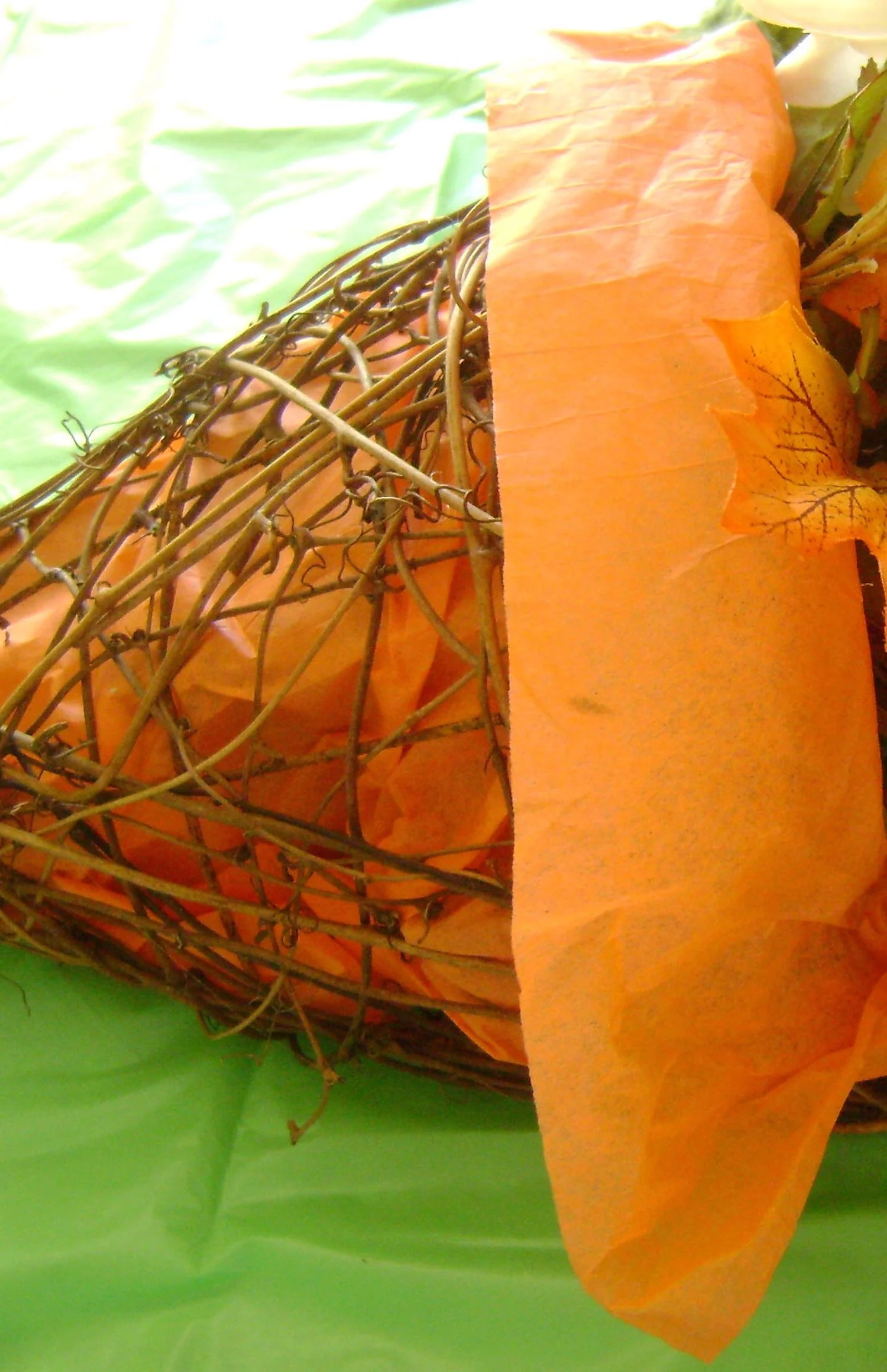 step 2 - Fold the excess tissue over the top front of the basket like a bib.