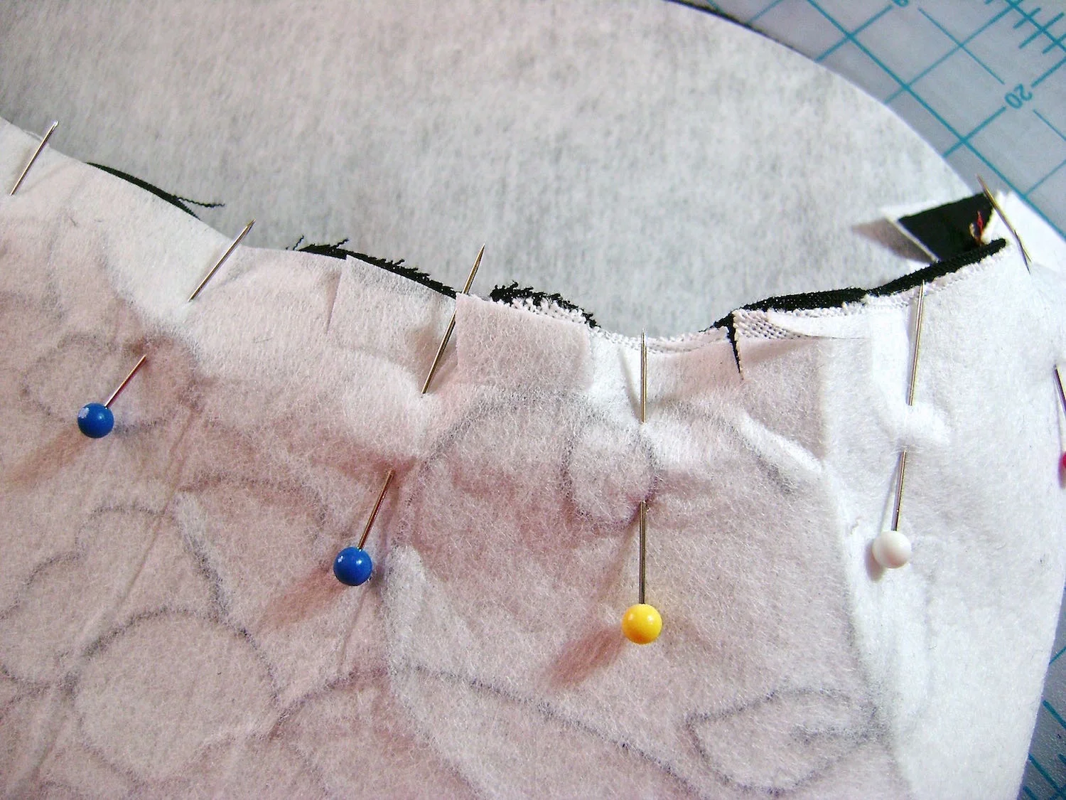 step 3 - Cut 1/2” slits on the purse edge to allow easier alignment on the curves.