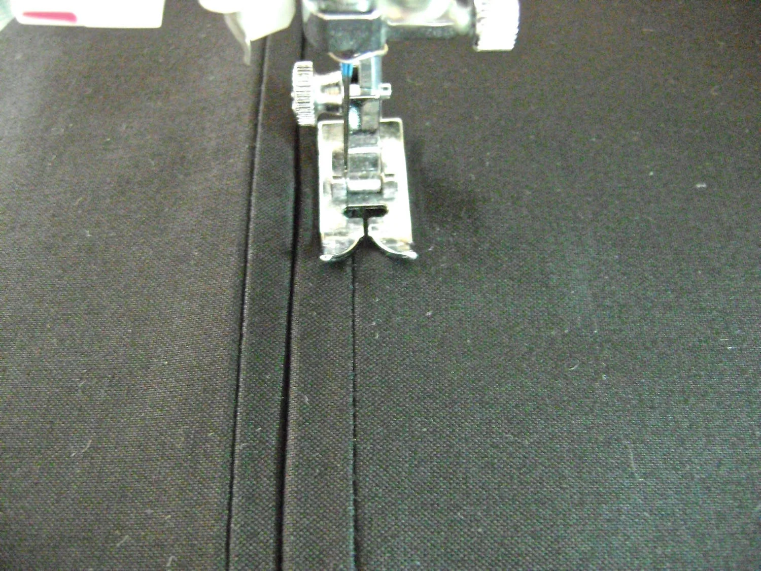 step 7 - Attach the zipper by sewing along the rectangle on the right side of fabric.