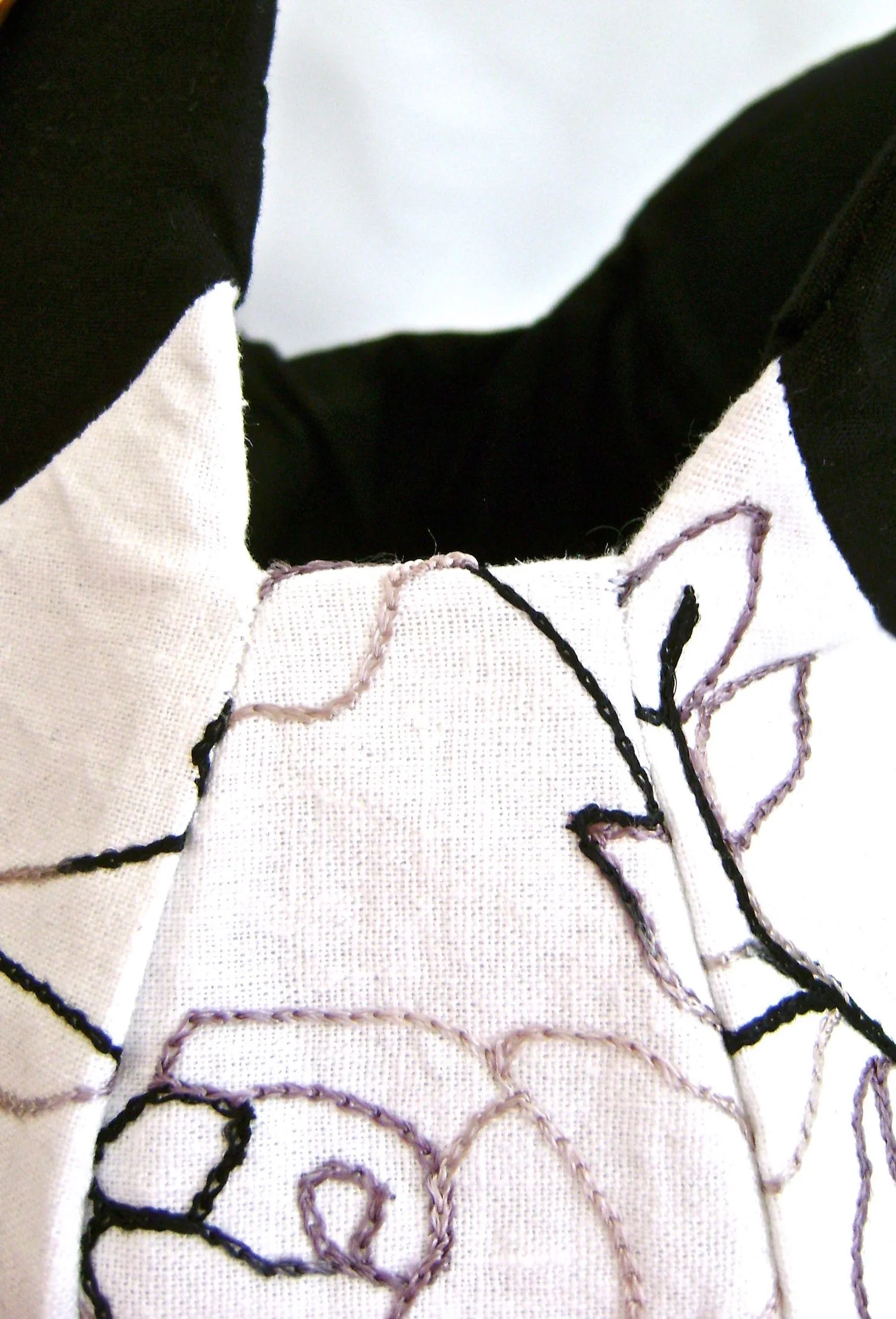 step 4 - Grab all layers of the bag and turn it inside out so the right side of the purse is outside and the lining is inside. Smooth out and press seam edges and the corners where the gusset attaches to the front and back.