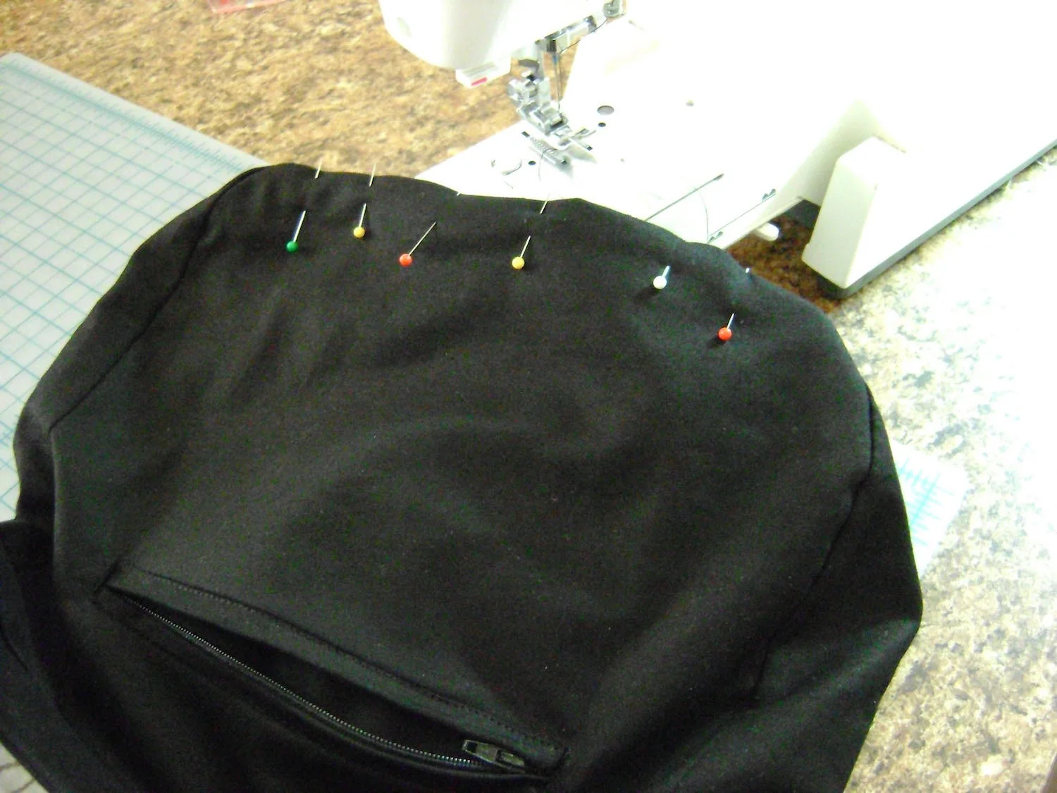 step 9 - Pin the two open bottom seams together and top stitch close to the edges.