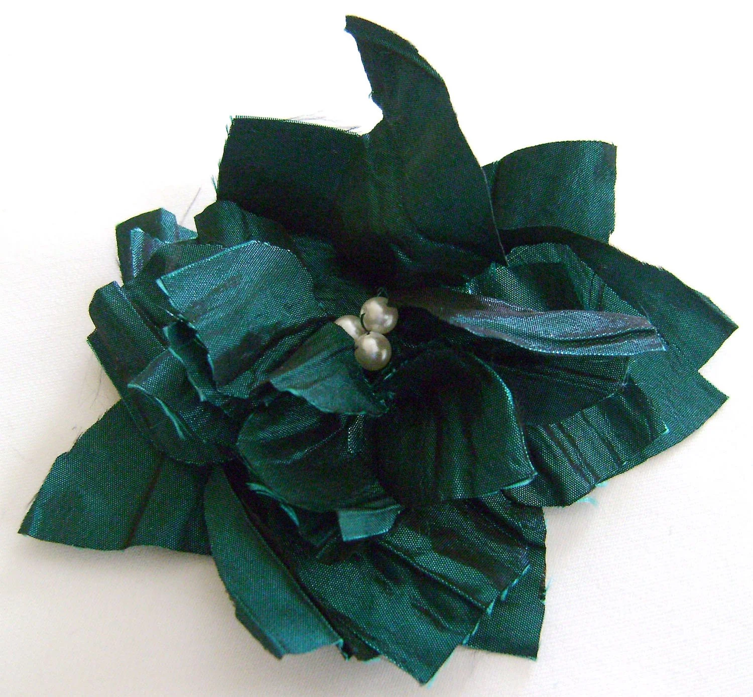 Crinkled taffeta with pearl center.
