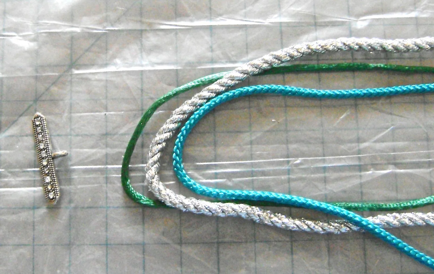 step 1 - Fold the cords in half. 