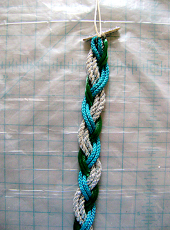 step 4 - Braid holding two cords of the same color.
