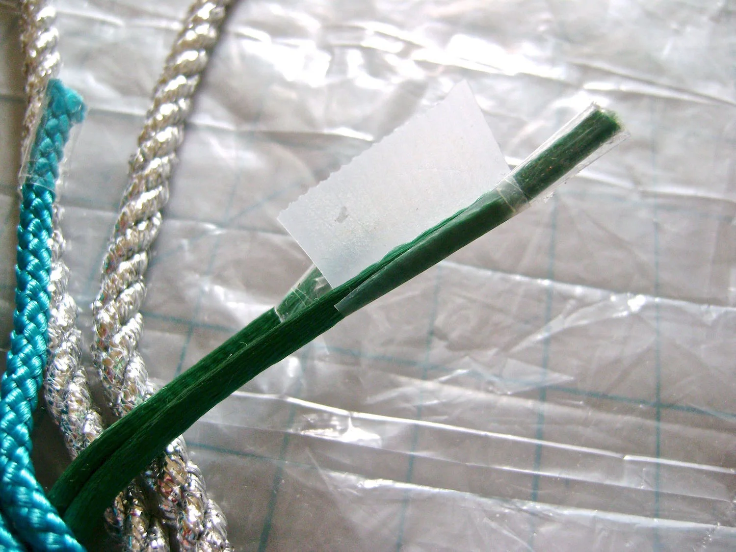 step 5 - After braiding, attach tape to all ends to control fraying.