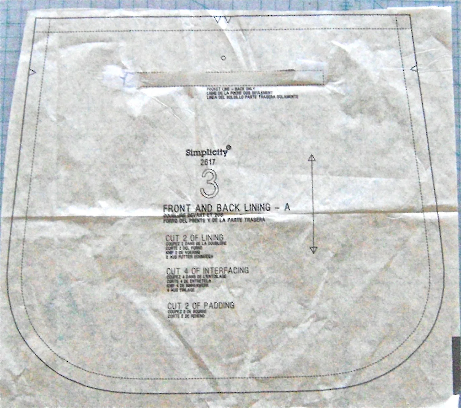 step 1 - Trace the Simplicity pattern lining piece for bag “A”. Cut it out and use it as a guide to create new pattern pieces that will form the shell for my bag.