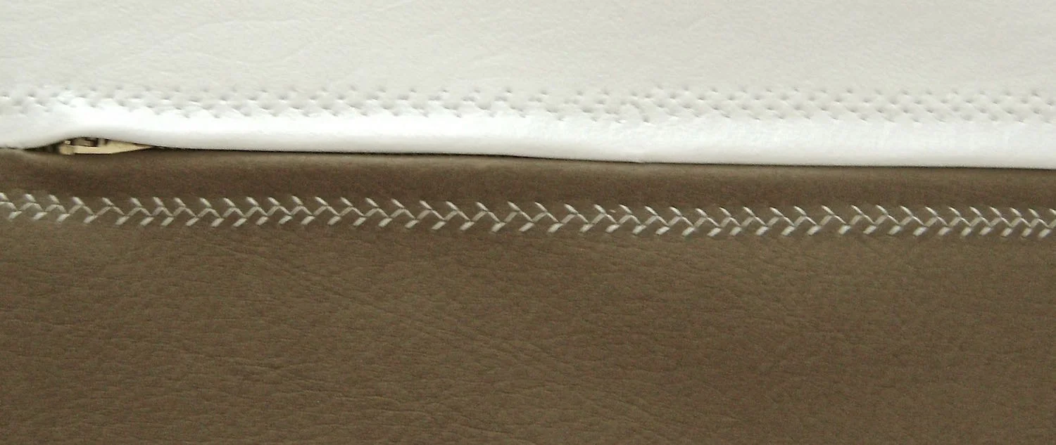 step 6 - Using a feather stitch, top stitch the zipper to the vinyl across the white piece then the Chestnut piece on both the front and back bag sections.
