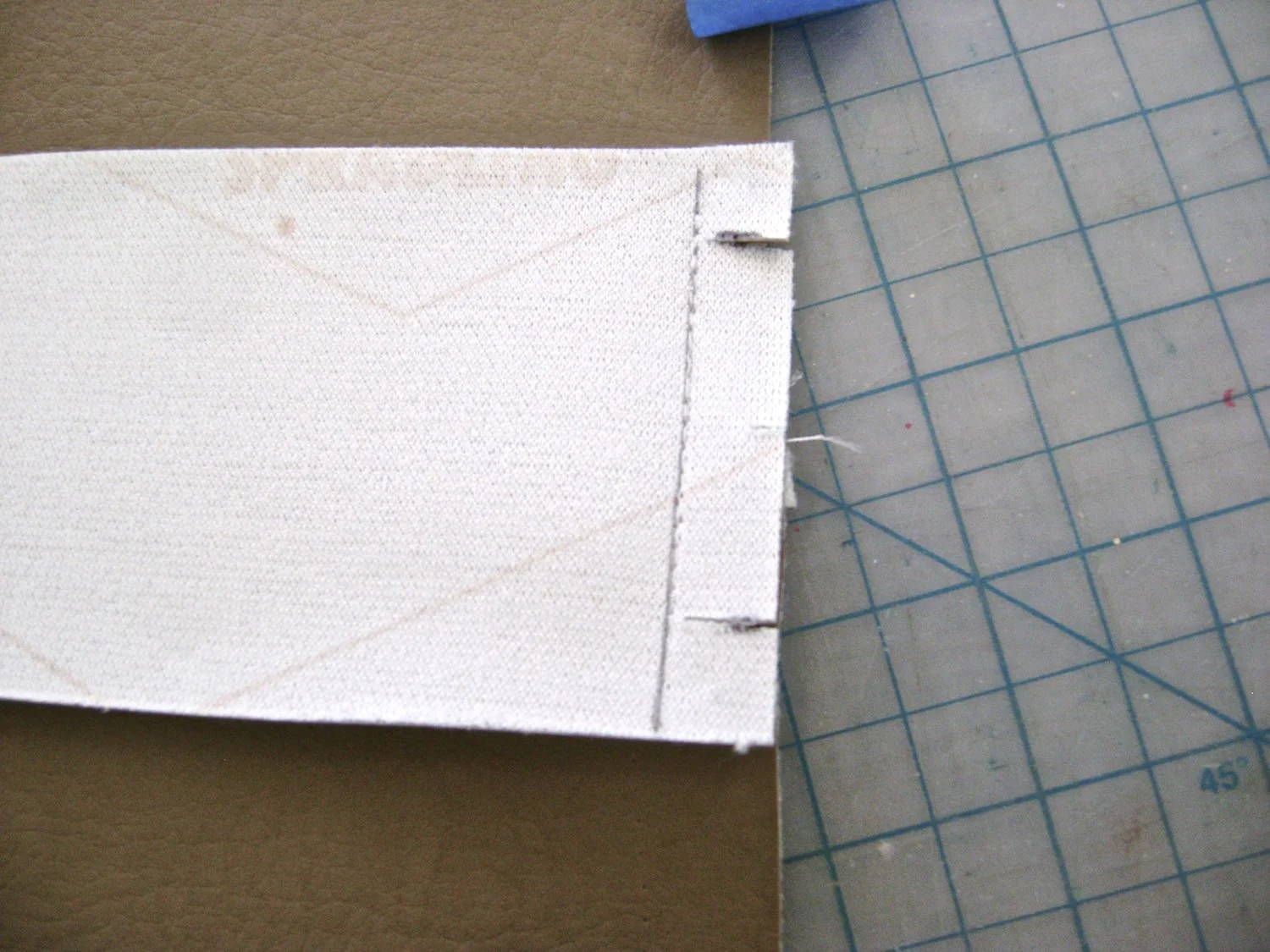 step 12 - Cut slits 5/8” from edges of sides pieces.
