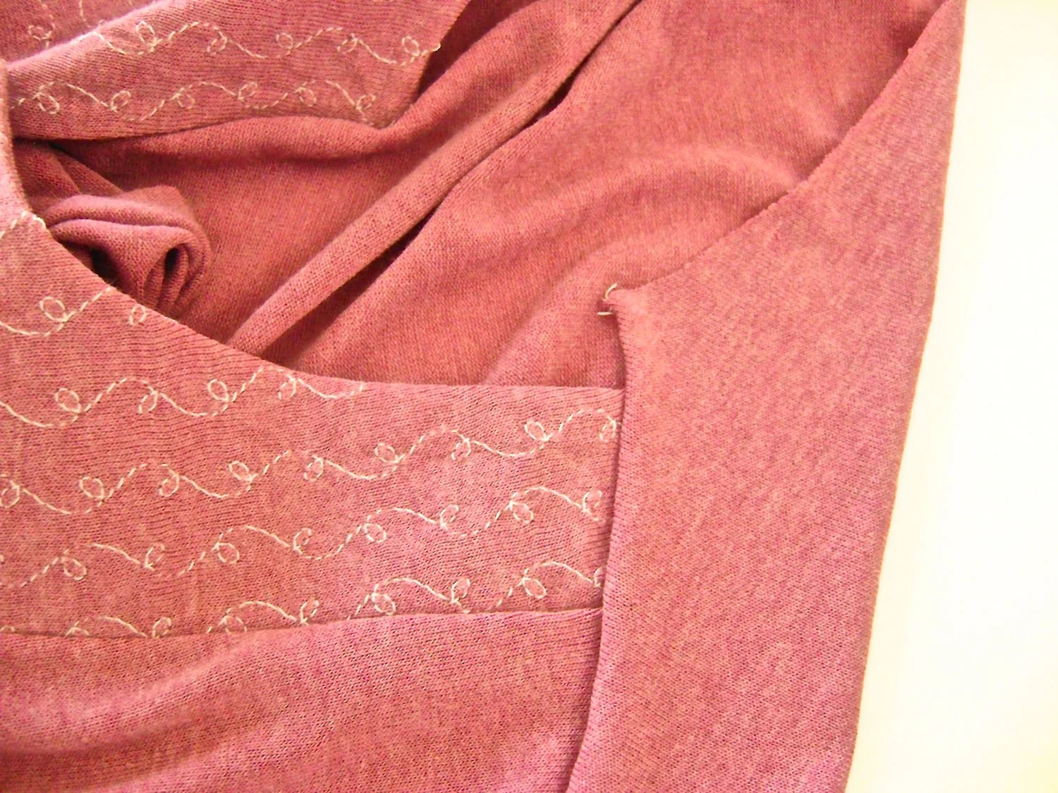 step 15 - Sew the shirt’s shoulder seams together. The back neck will extend 5/8” longer than the finished front. 
