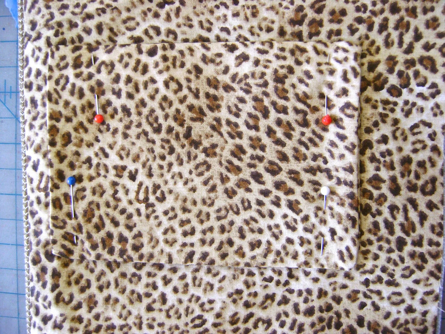 step 6 - If you want additional pockets inside the large outer front pocket sew them to the lining now. I added a 4" x 5.5" pocket to keep my iPhone handy outside the bag. Scroll to “What’s In The Bag?” below to see what else I added.