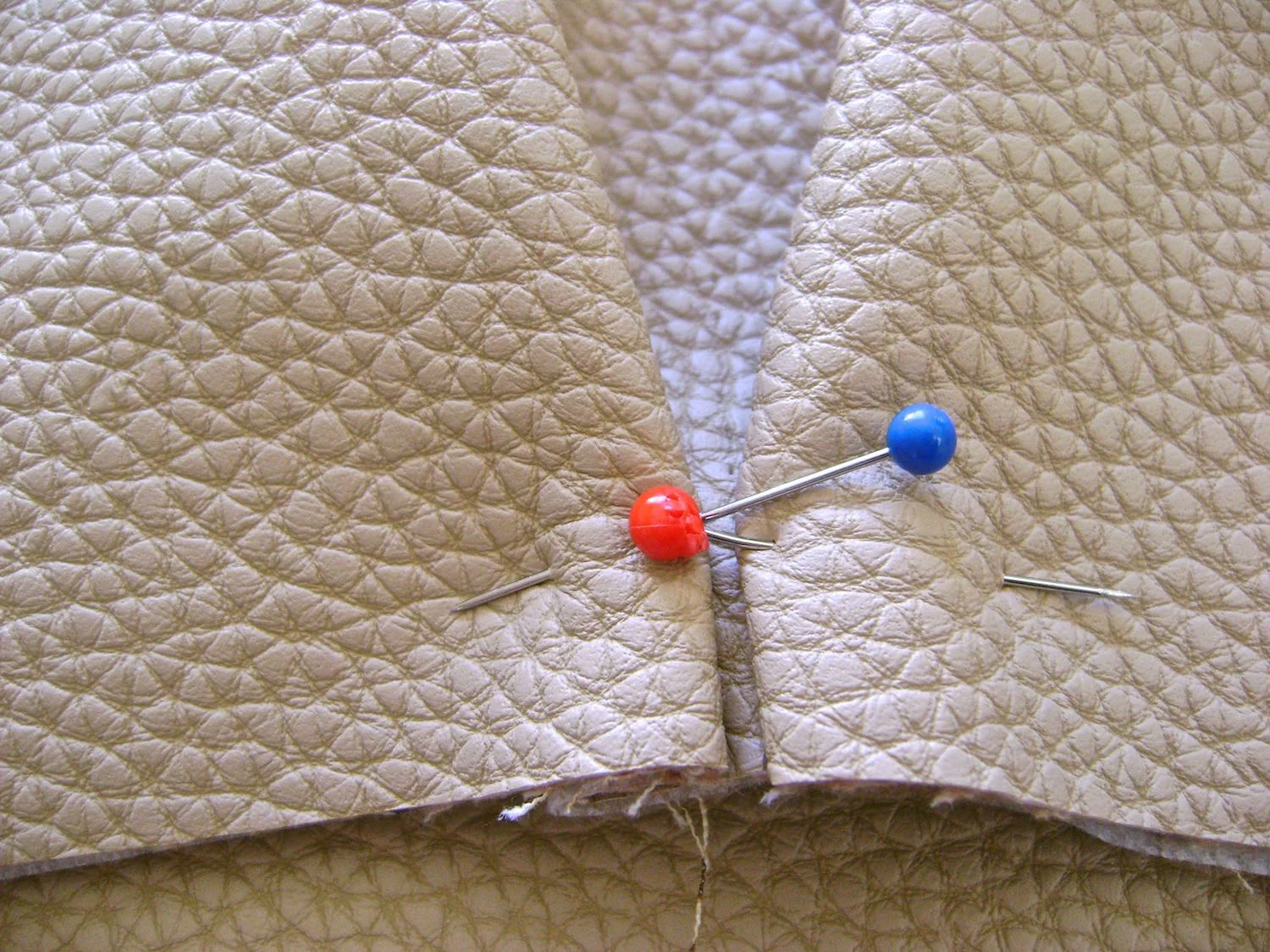 step 8 - Pin .25" folds facing the center of pocket at the bottom edge.
