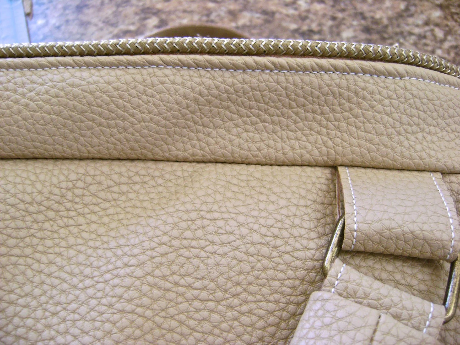 step 30 - With the four tabs in place, sew the raw edges of one band and fleece around the top of the bag.