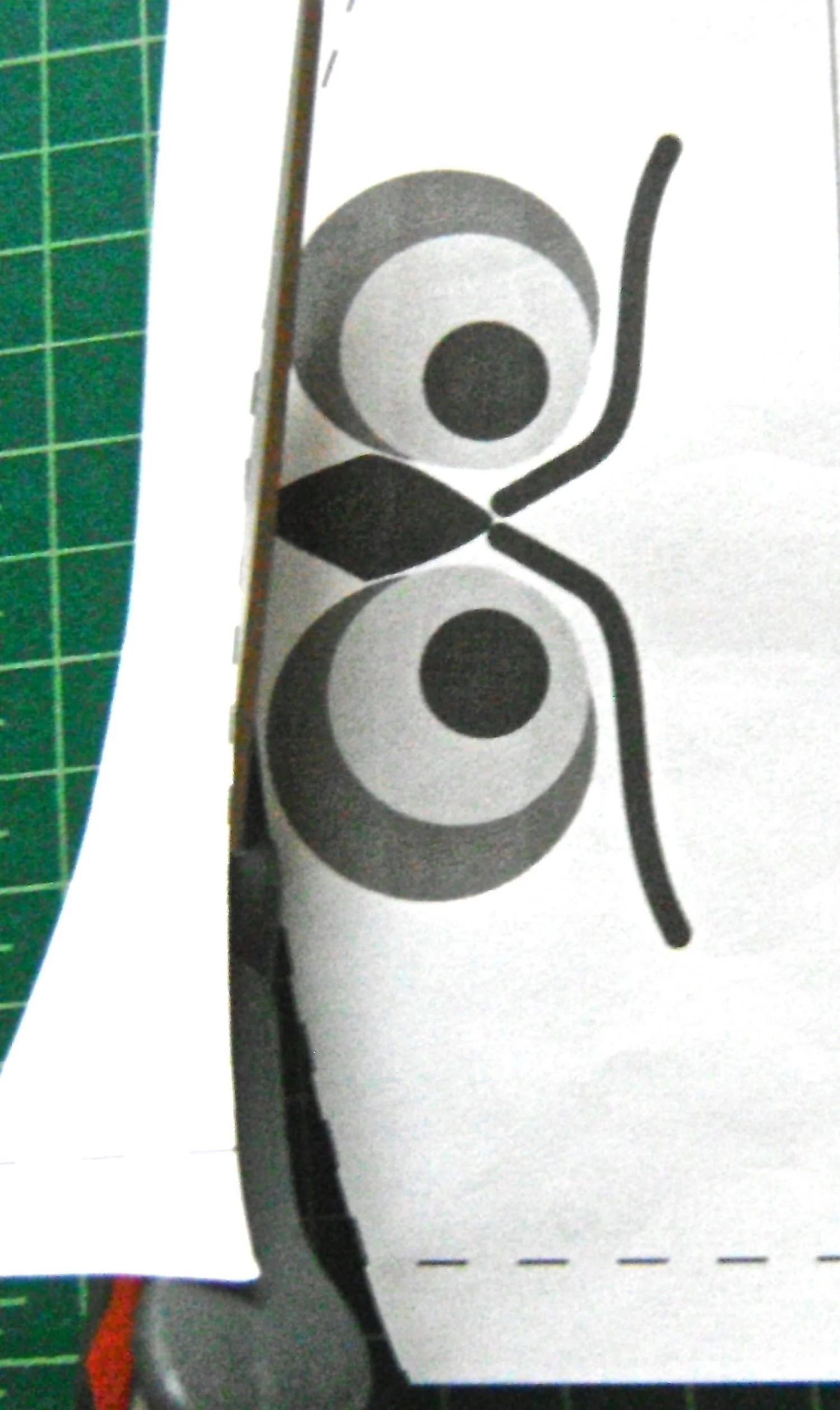 step 9 - Trim the seam allowance from the front flap pattern piece and align the pattern with the fabric edge.