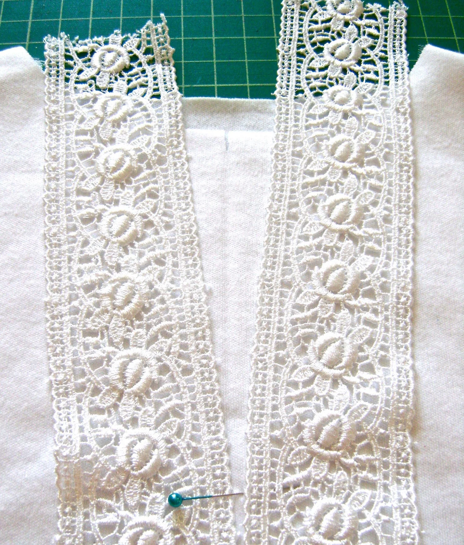 step 5 - Move the top of the lace strips .75” away from the center crease but still meeting at the mark for the opening.