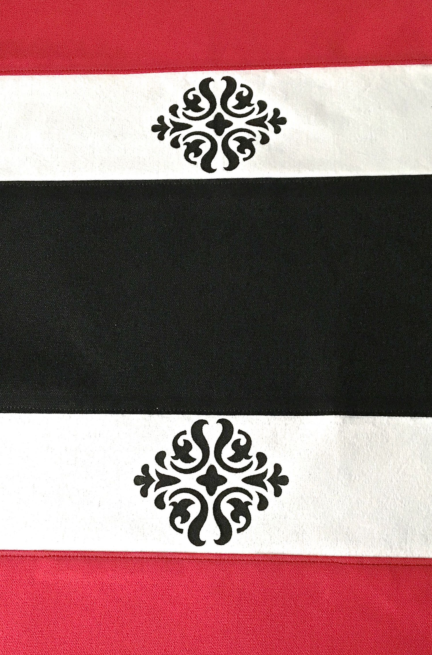 step 5 - Sew white panels to each edge of the black panel.