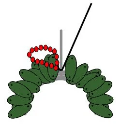 step 10 - Wrap the wire around the tail twice. Form a loop with the red beads.