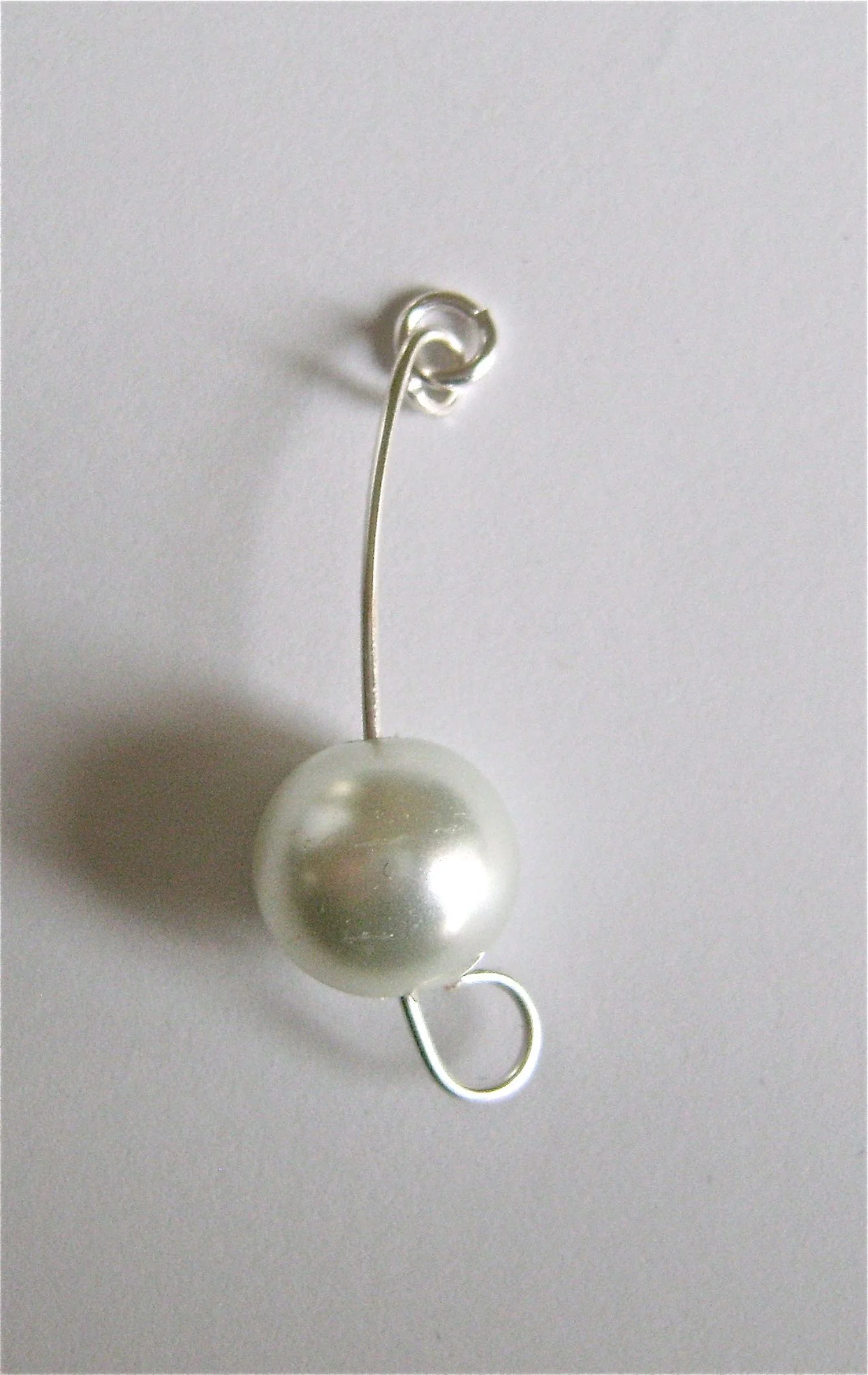 step 4 - Attach a 5mm jump ring to the small curl in the wire.