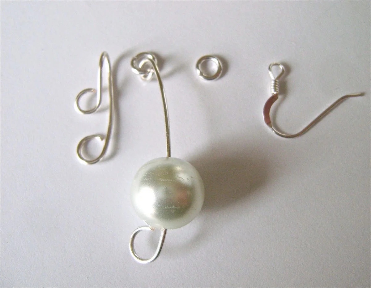 step 6 - Create another earring which mirrors the first and is assembled in the opposite order. Wear this earring in your right ear.
