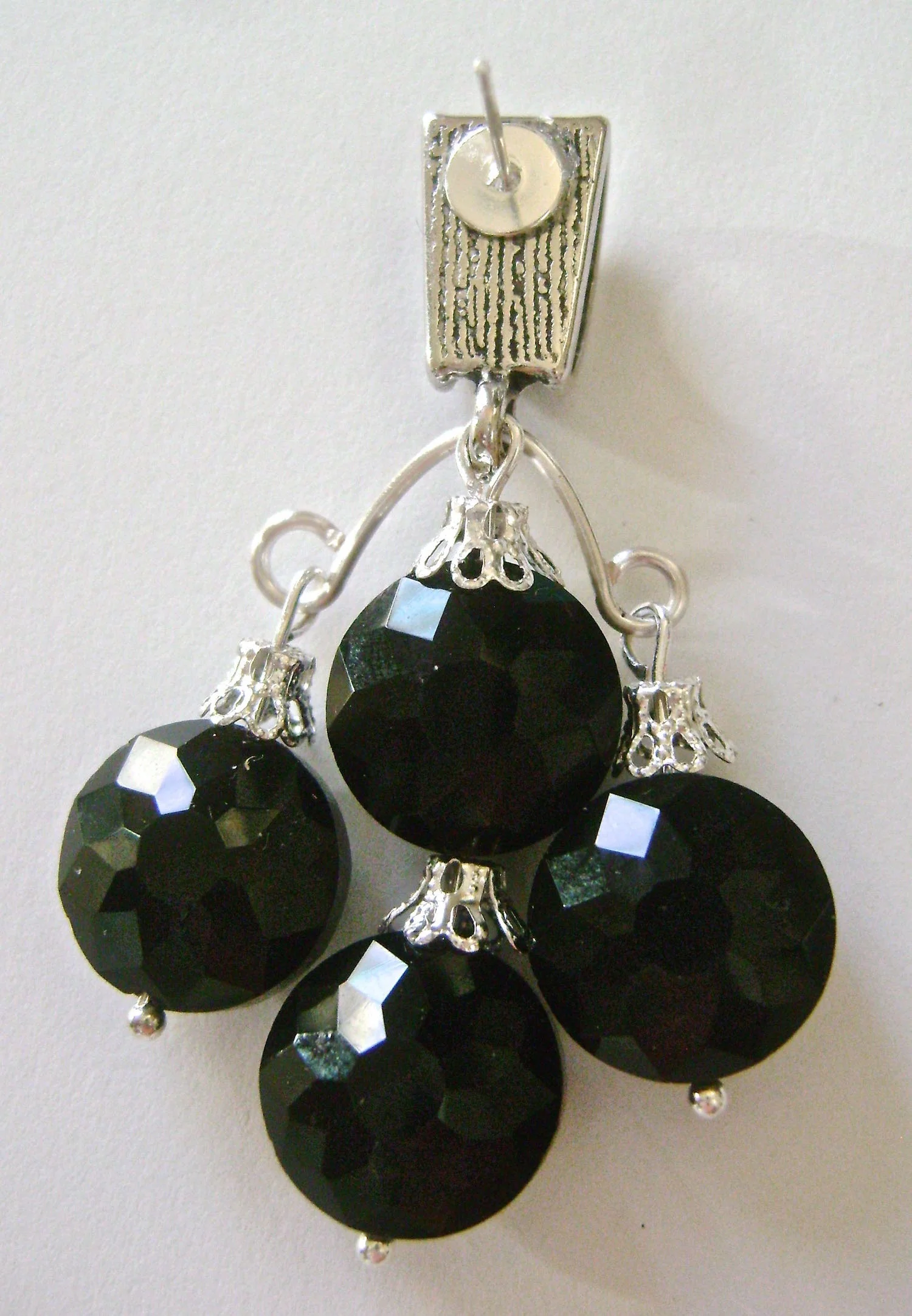 step 8 - Glue an earring post to the back of the bail near the top edge. Allow the glue to set overnight.