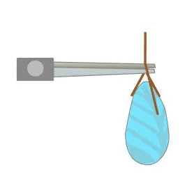 step 4 - Hold the spot where the wires meet between round nose pliers. With your fingers, press the long wire over the top of the pliers creating the first step of a loop.
