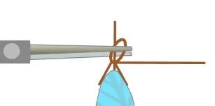 step 6 - Hold the loop and short stem with needle nose pliers.