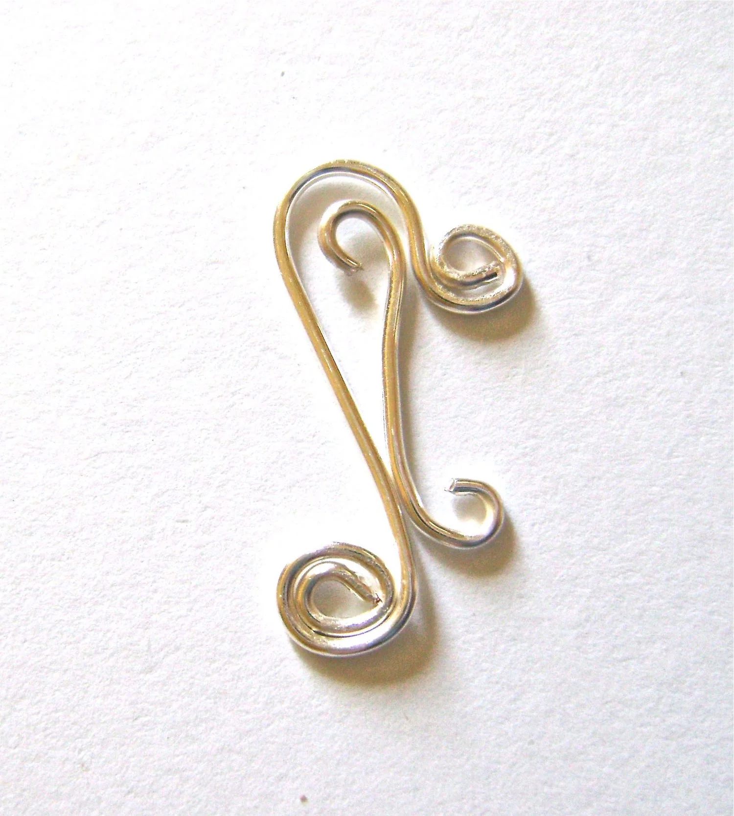 step 6 - Fit the “s” inside the main wire making adjustments in length or loops if necessary.