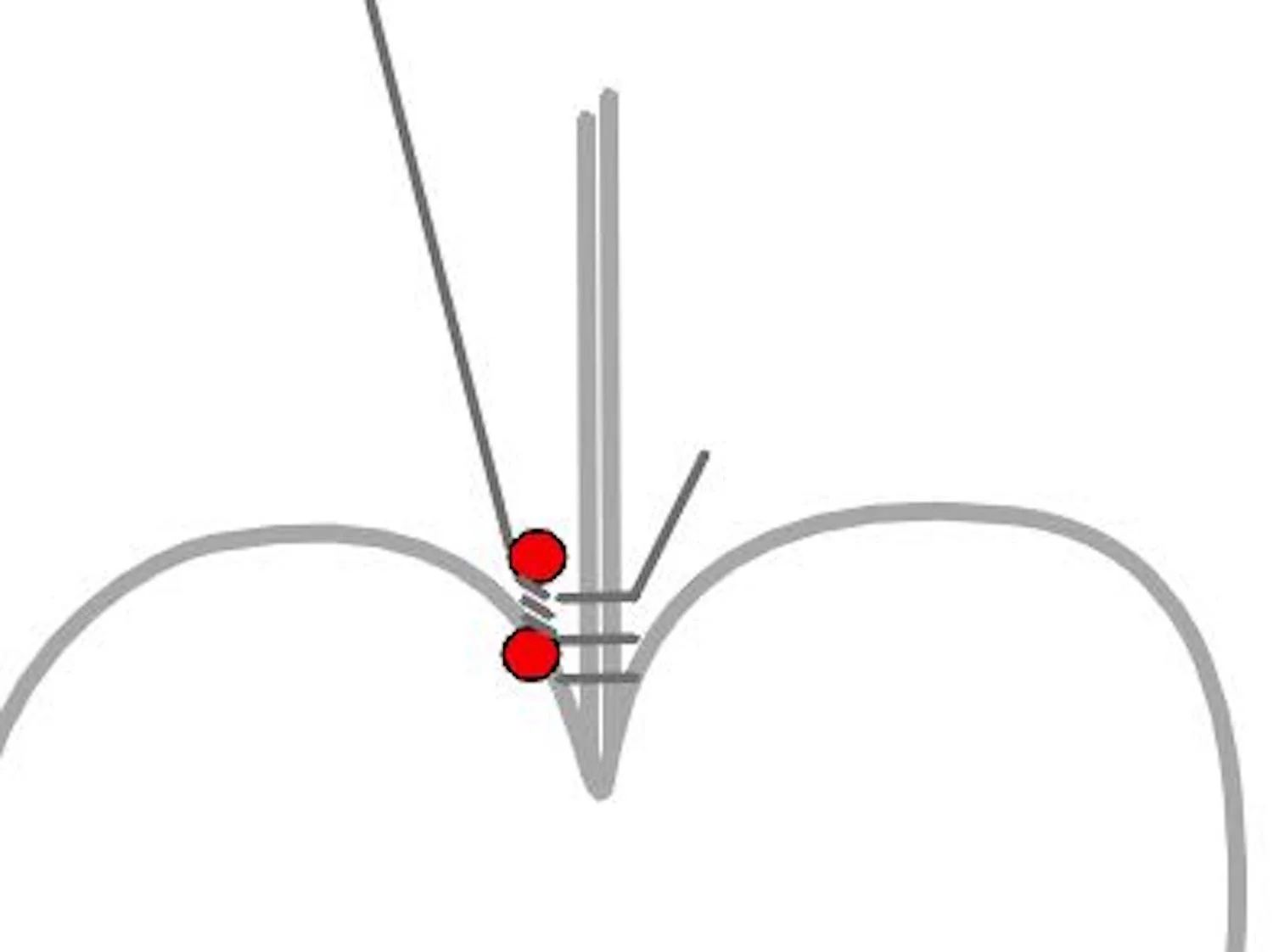 step 6 - Leave about 1/4” space between the red beads. Grasp the second bead and twist it three times creating a wrap between the two beads.