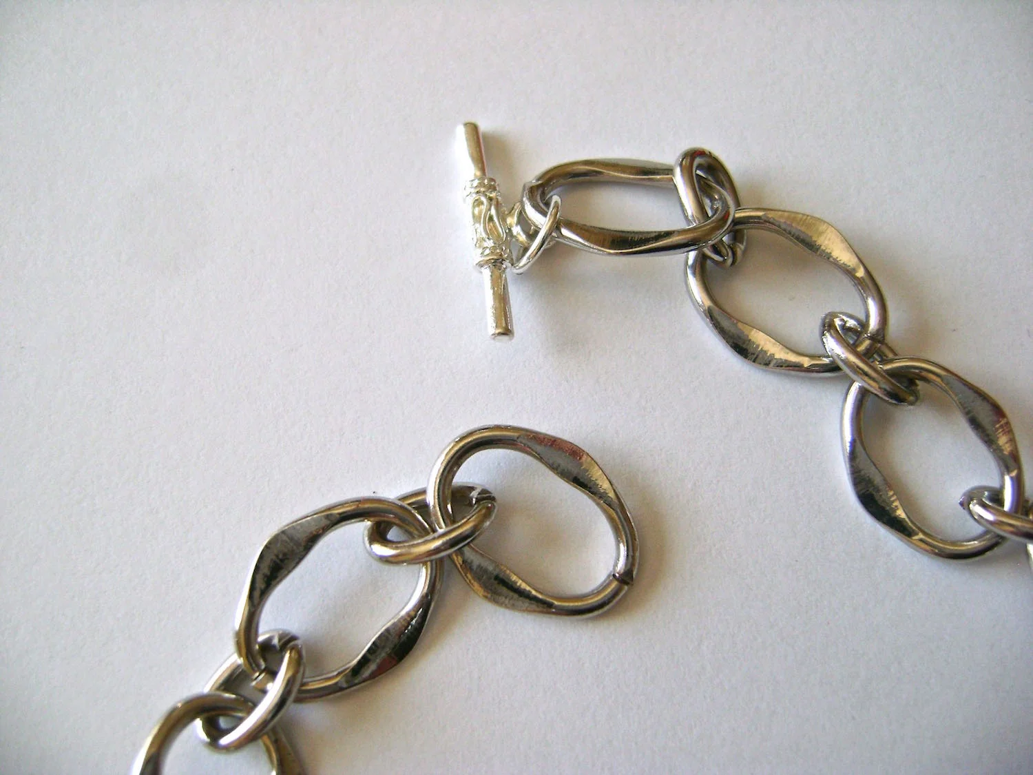 step 7 - Complete the necklace by connecting a toggle clasp to the end of the chain with a jump ring.