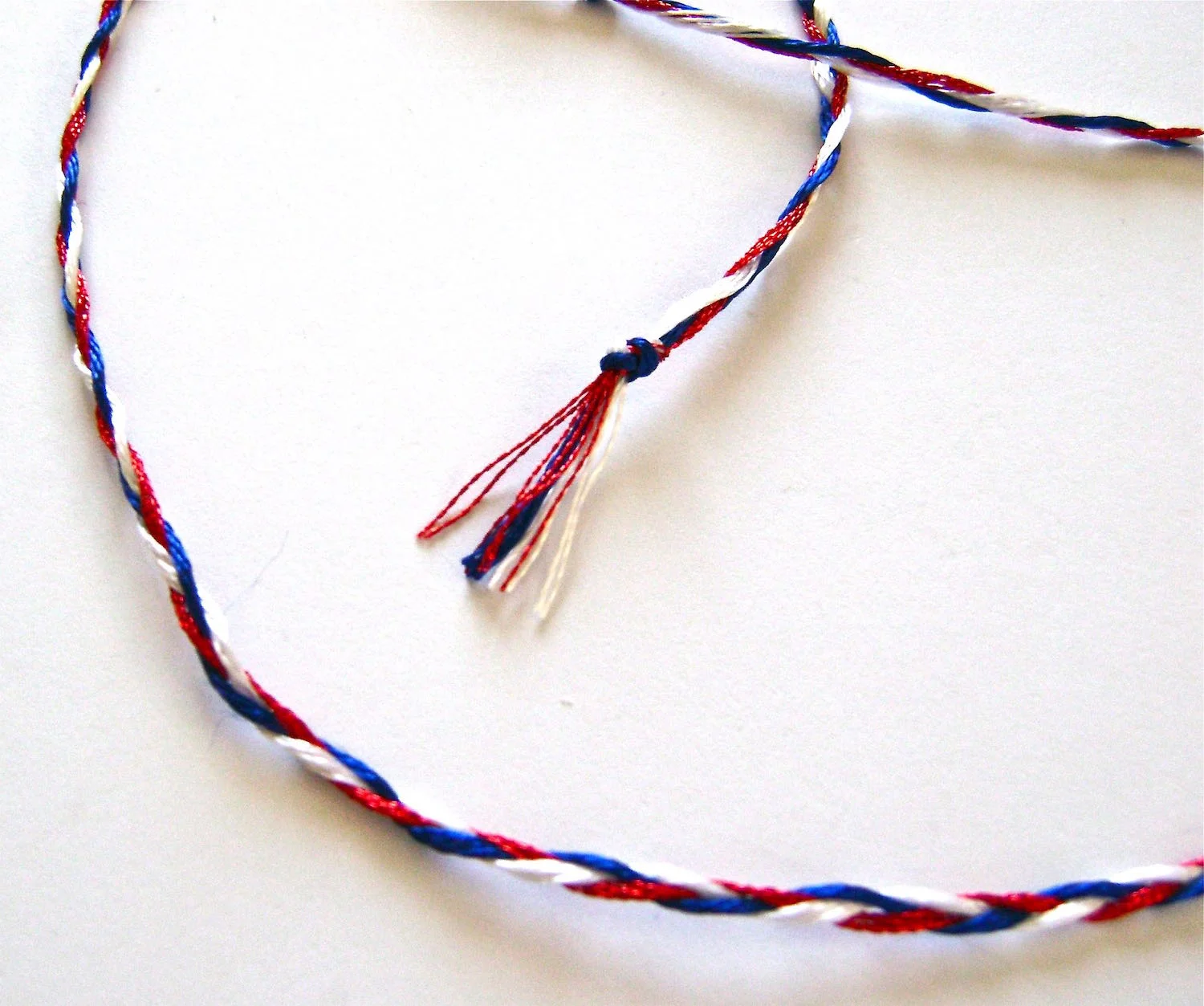 step 6 - Braid the strands together until you have 18” or the length you want for your necklace. 