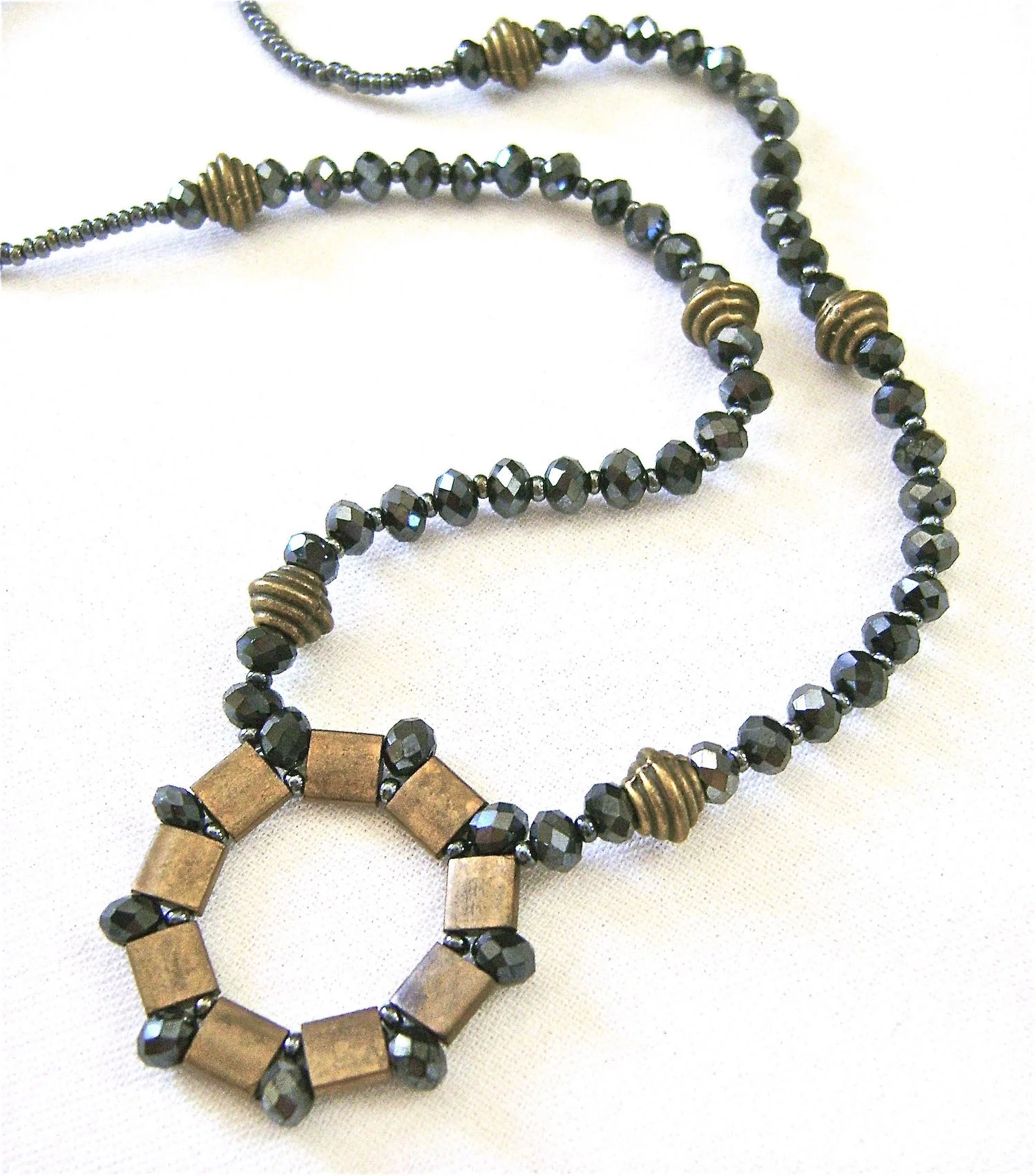 pendant measures 1.25 necklace measures 15" long"