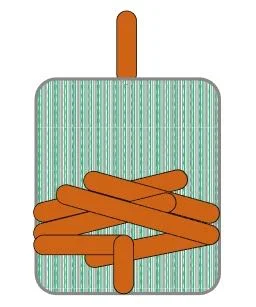 step 7 - On the back of the bead, create a 90 degree bend in the 10” long wire. Slip the wire into the hole in bottom of the bead. Pull it through the top. Bang the bottom against the work surface to flatten the inserted wire bottom.