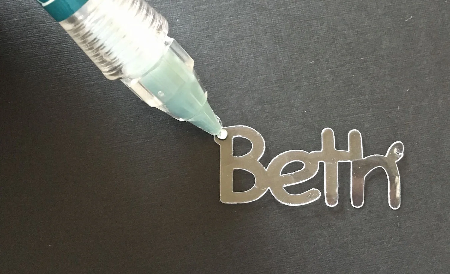 step 8 - The placement of rhinestones can be made easy with a Pick.Me.Up tool.
