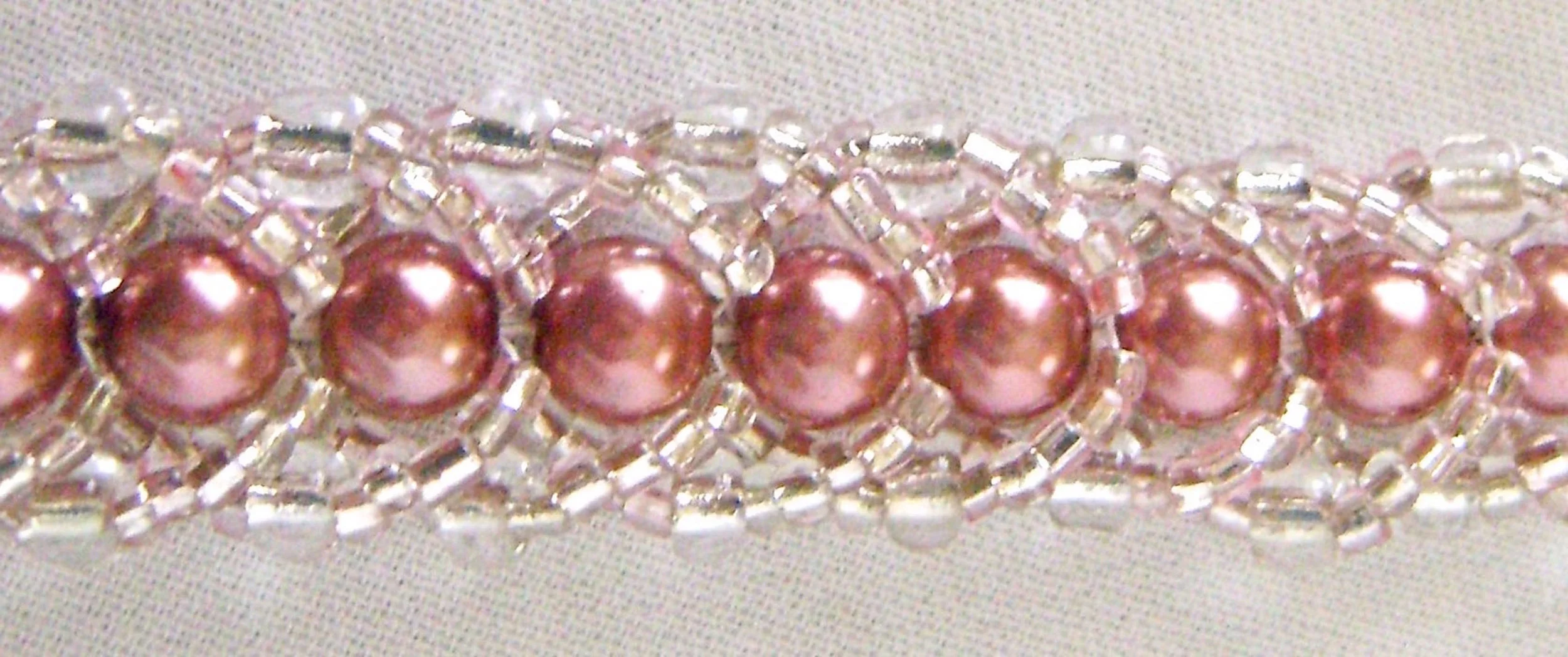Pearls in 6mm dusty rose, 4mm clear crystals, clear and pink seed beads