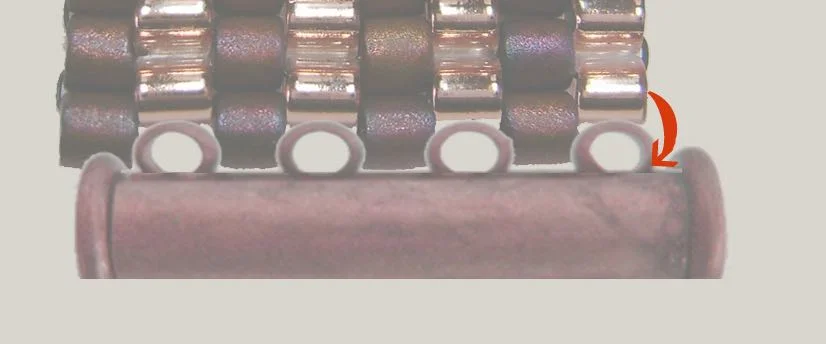 step 1 - In this example, the last row of beading is dark beads. Bring the needle through the right side of the first loop of the clasp.
