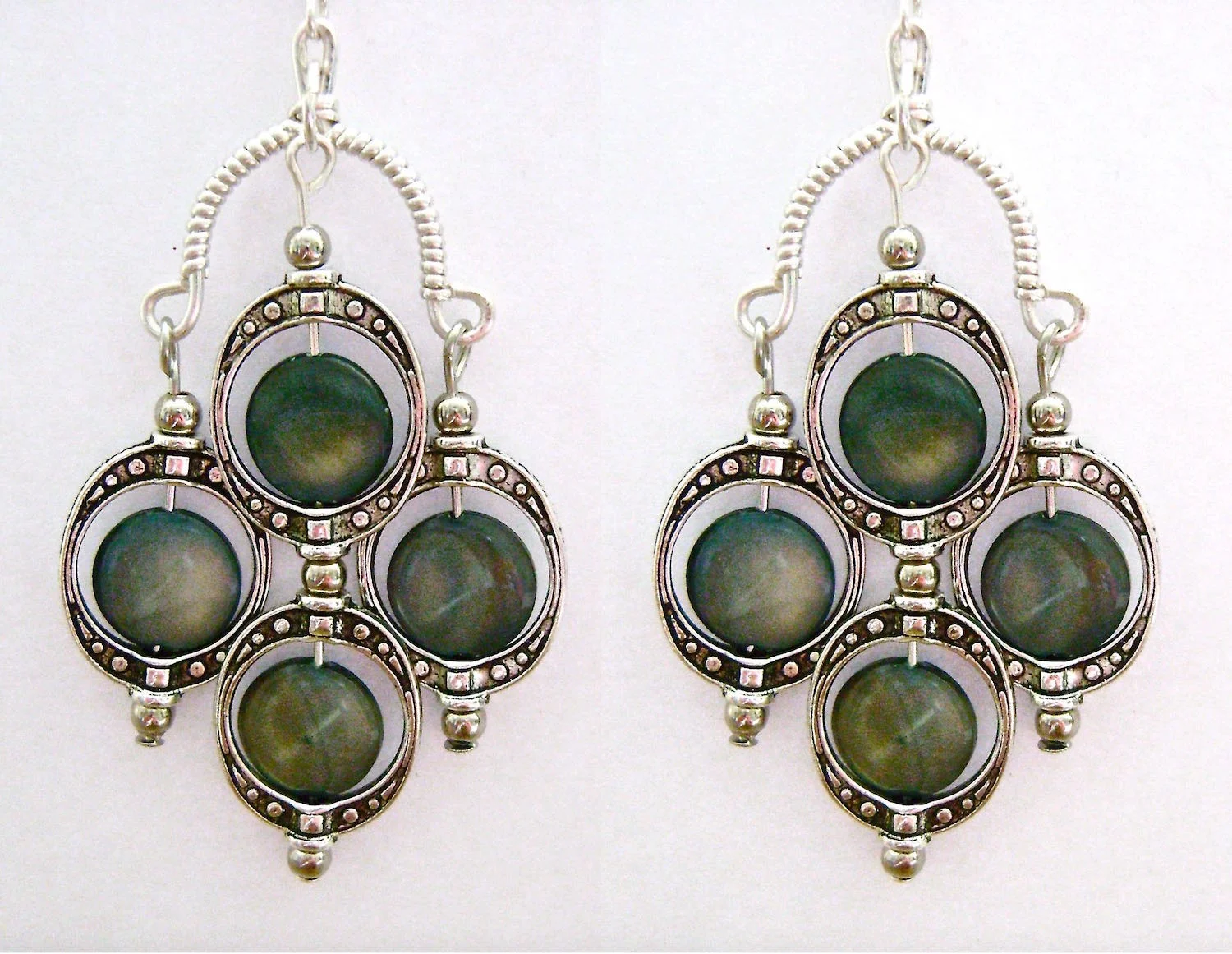 See the matching Blue Eyed Multi Drop Earrings .