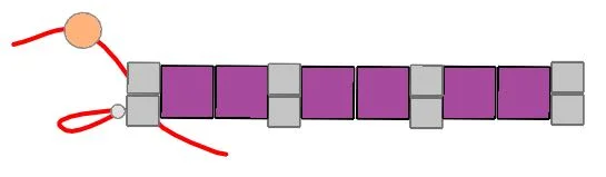 step 5 - Move the needle through the bottom hole of the stone bead.