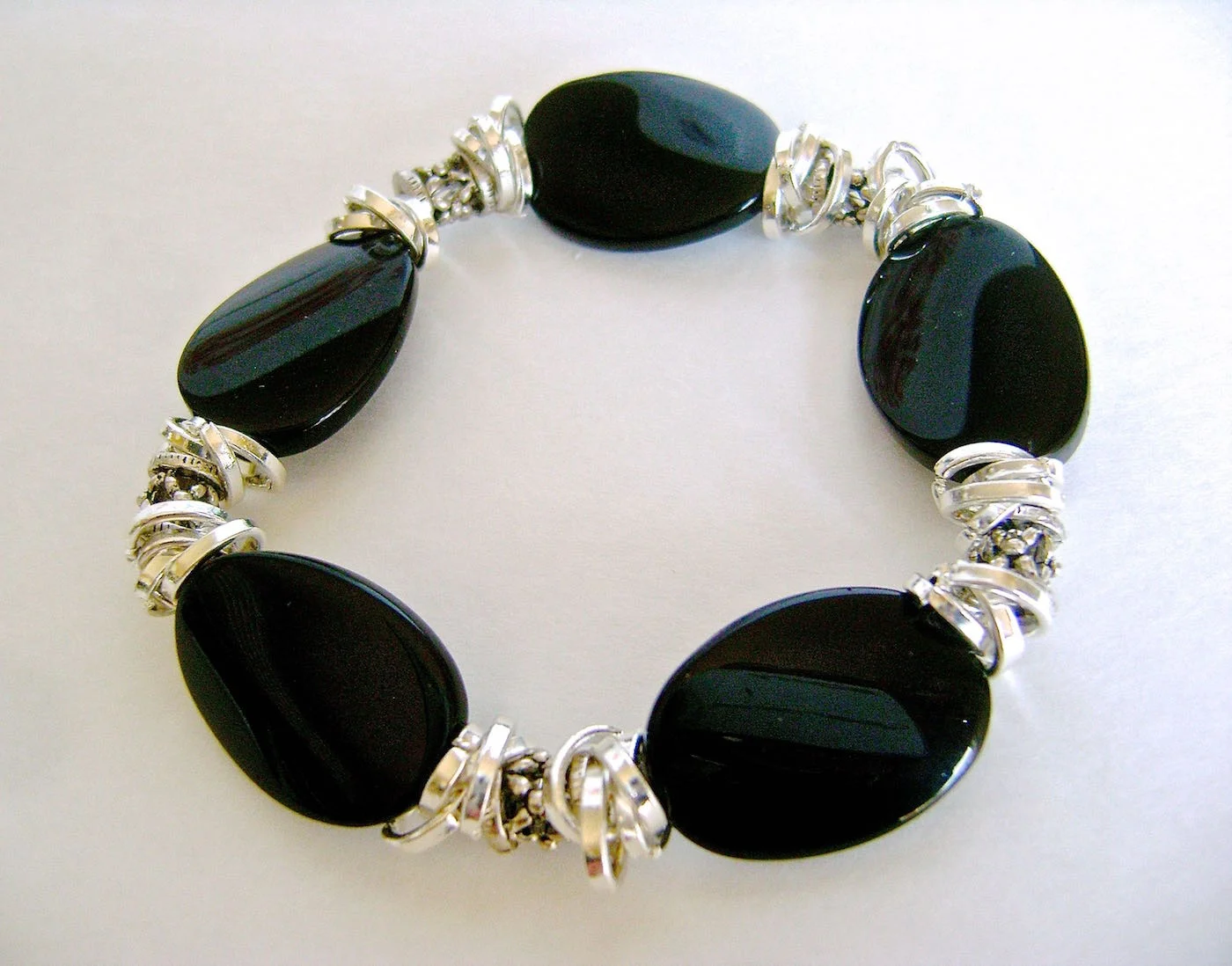 bracelet measures 7" For a smaller wrist use the same instructions but shorten each of the chain pieces by one or two links.