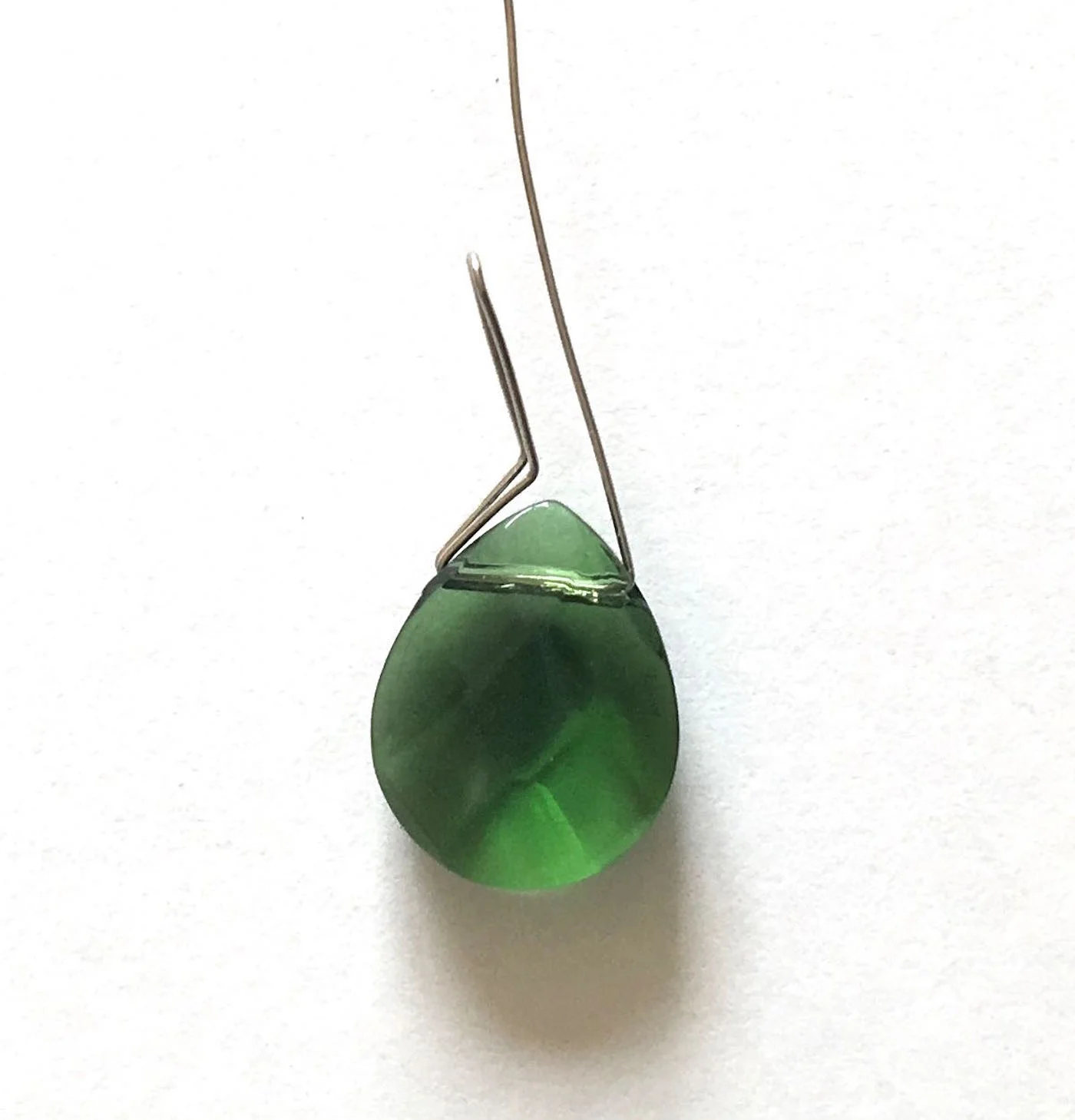 step 8 - Press the long wire up against the opposite side of the bead.