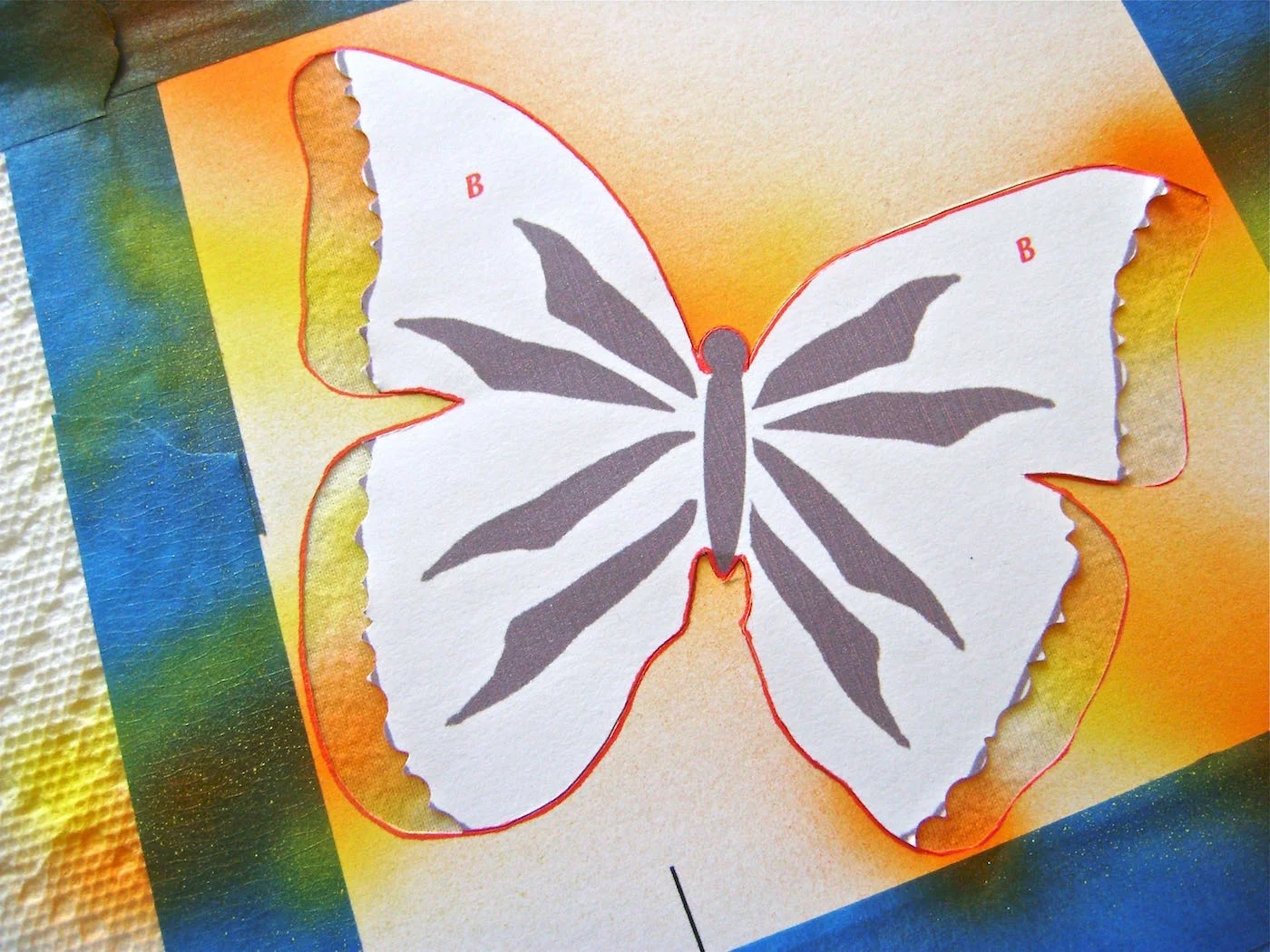 step 7 - Place the “B” section inside the stencil to protect the wings during the next step.