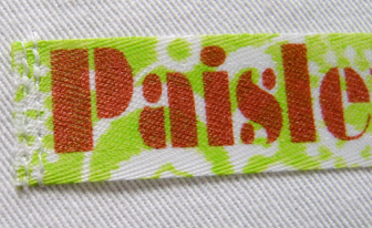 step 8- Create another row of stitching close to the first stitching to enclose the tape’s raw edge and prevent fraying. Sew the other end of the label using the same process.