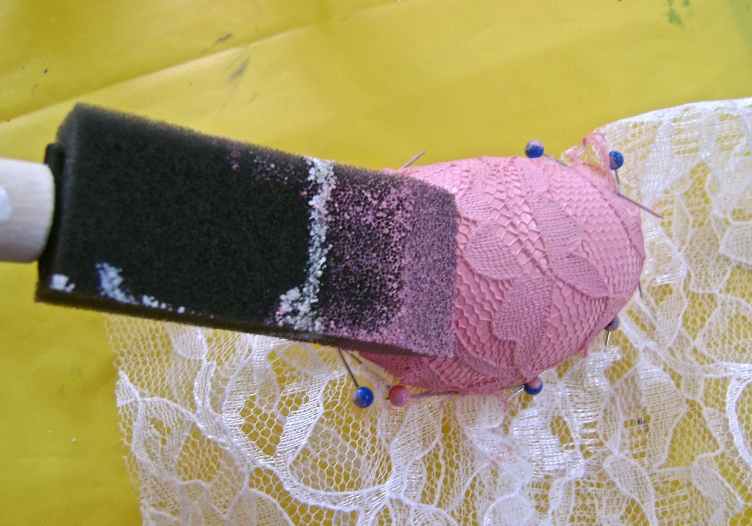 step 6B - Spray the egg or sponge paint on. Be sure to apply paint over the pinned seam. Beautiful designs can be achieved with different fabrics and even cheesecloth!