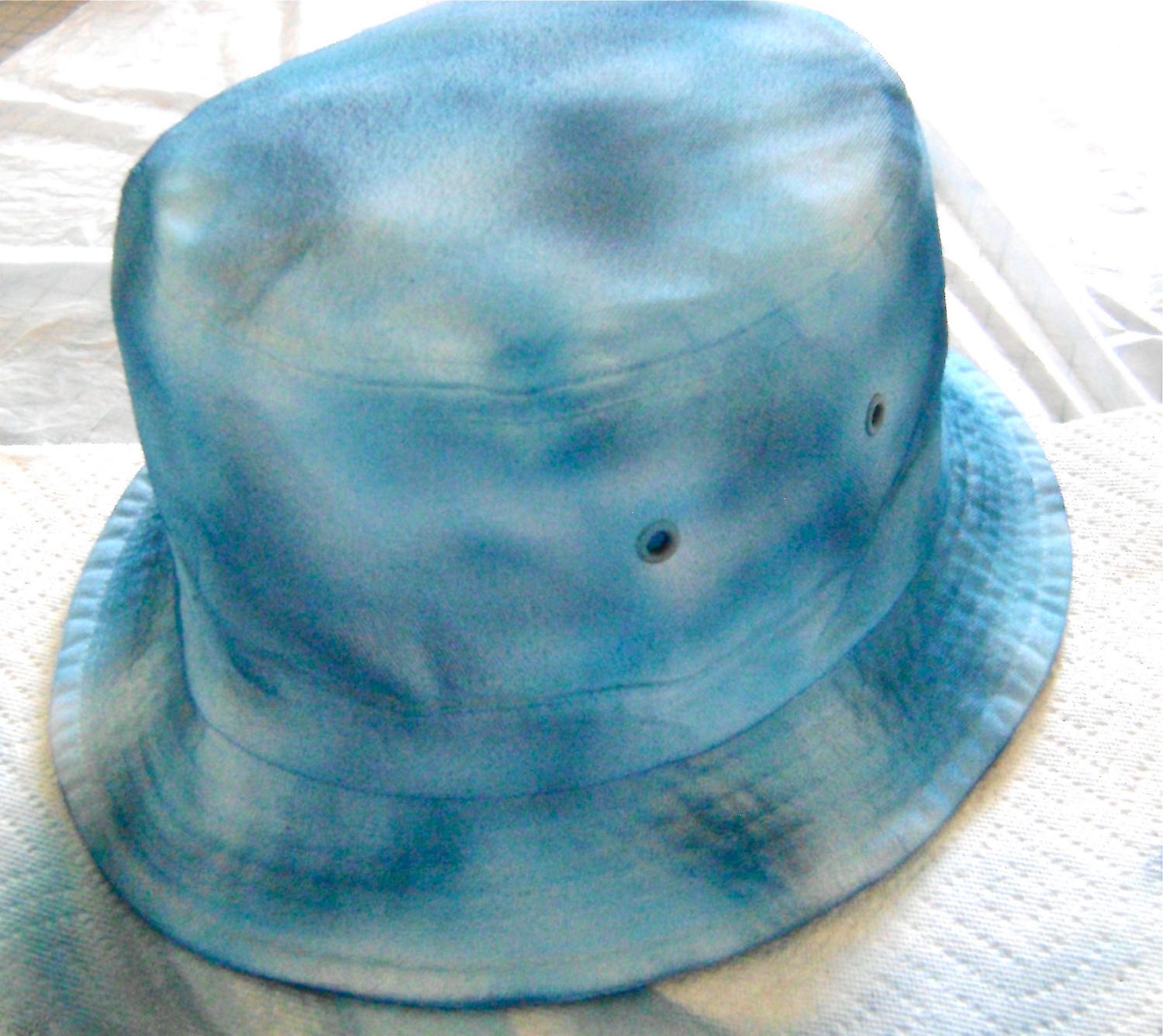 step 11 - Finish with dark blue. Again, leave some of the white of the hat showing.