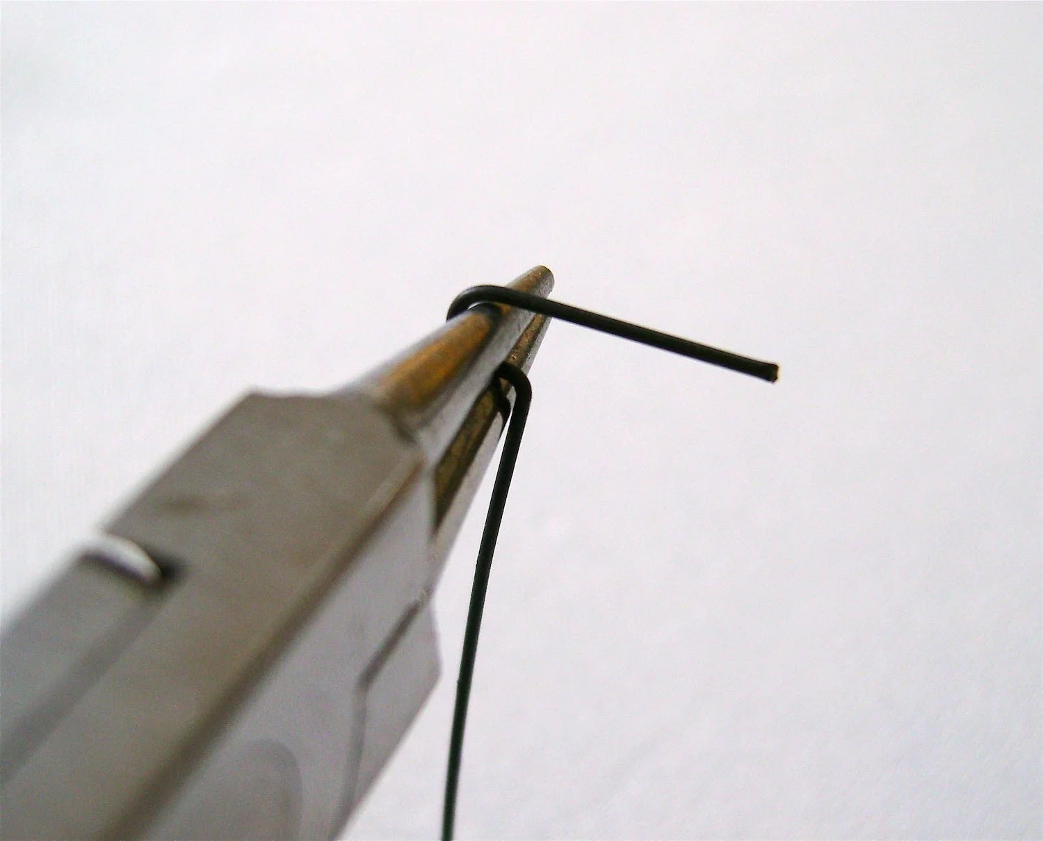 step 14 - Bend the wire over the round nose pliers.