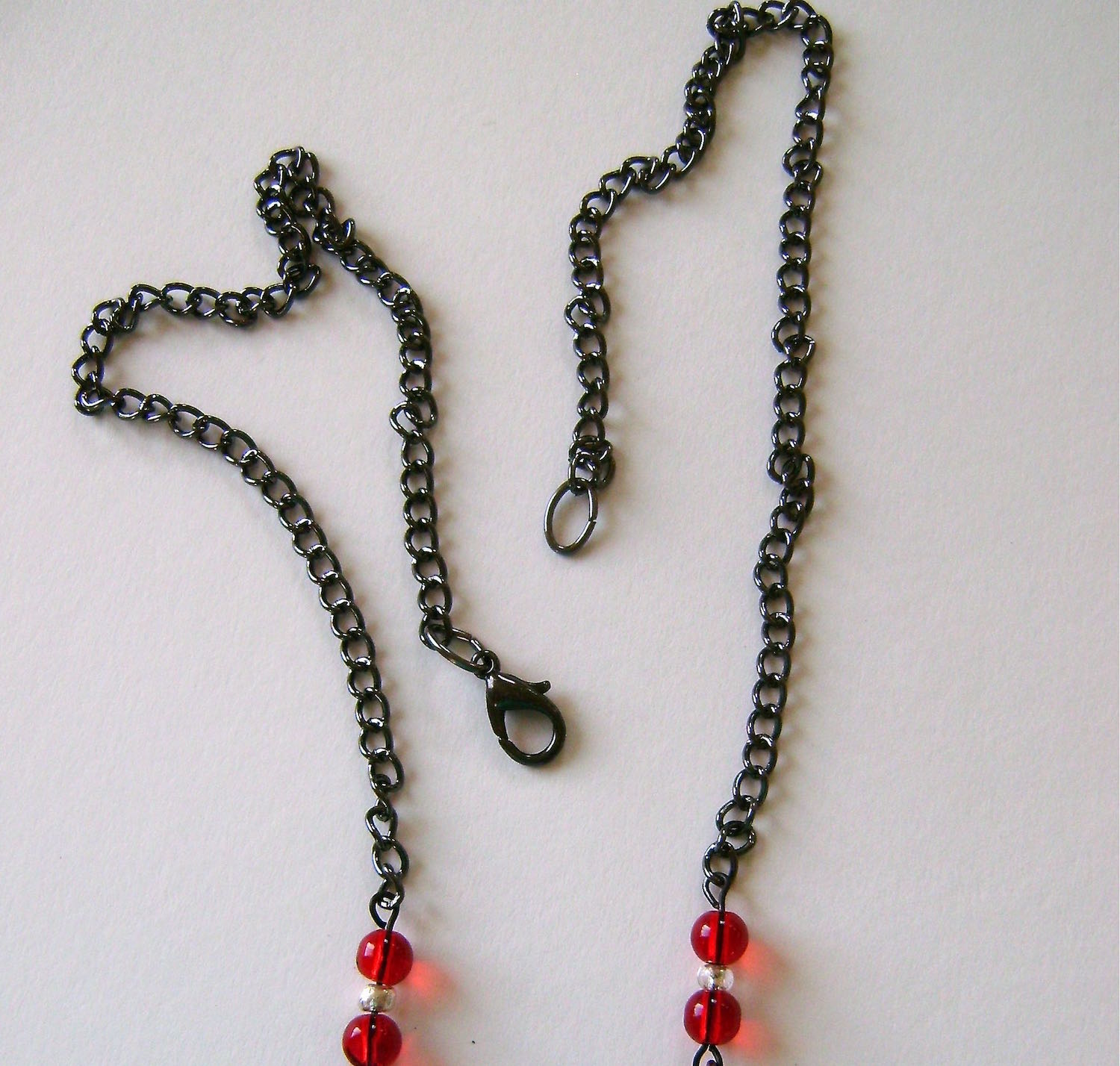 step 24 - Attach a jump ring to one chain end and a jump ring and clasp to the other.