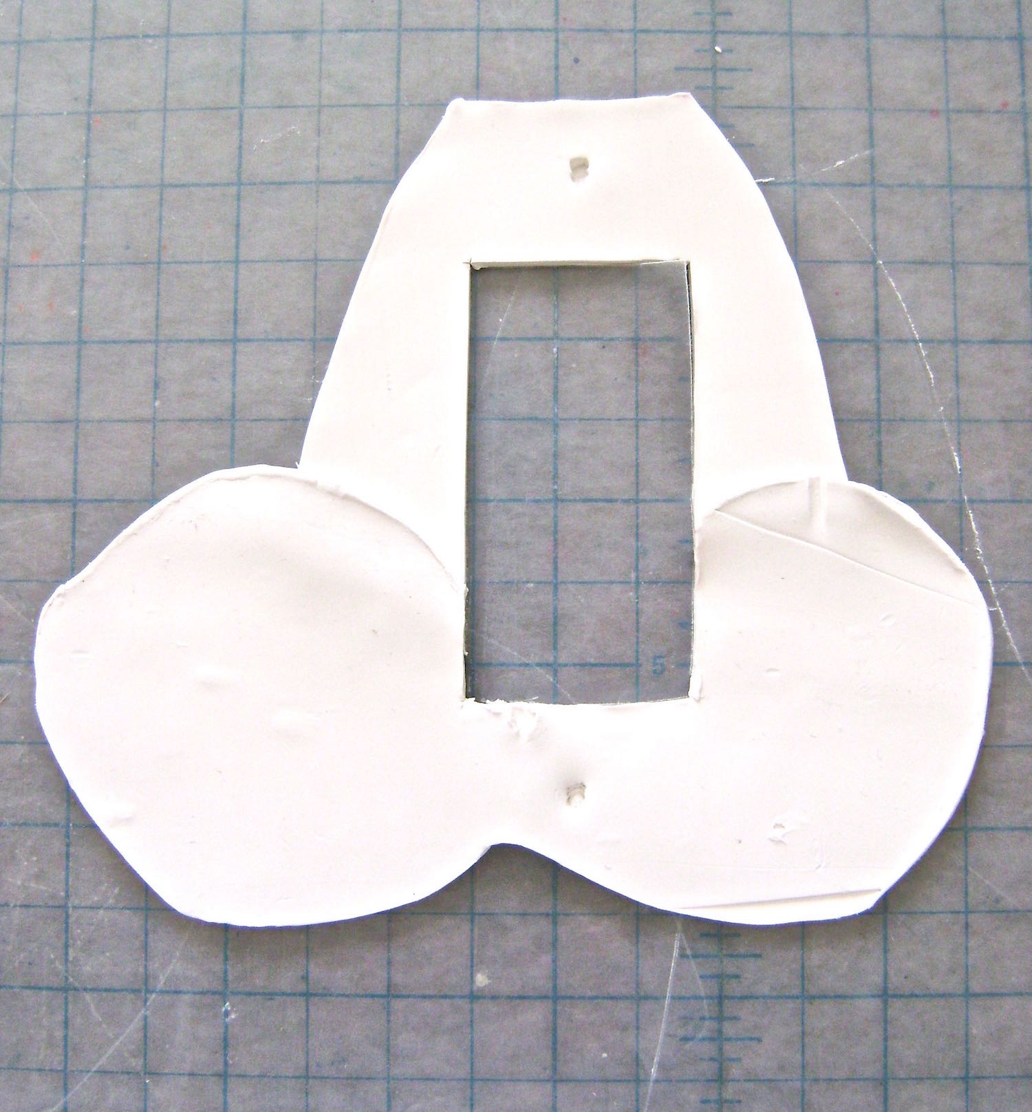 step 7 - Using a craft knife, cut out the switch opening.