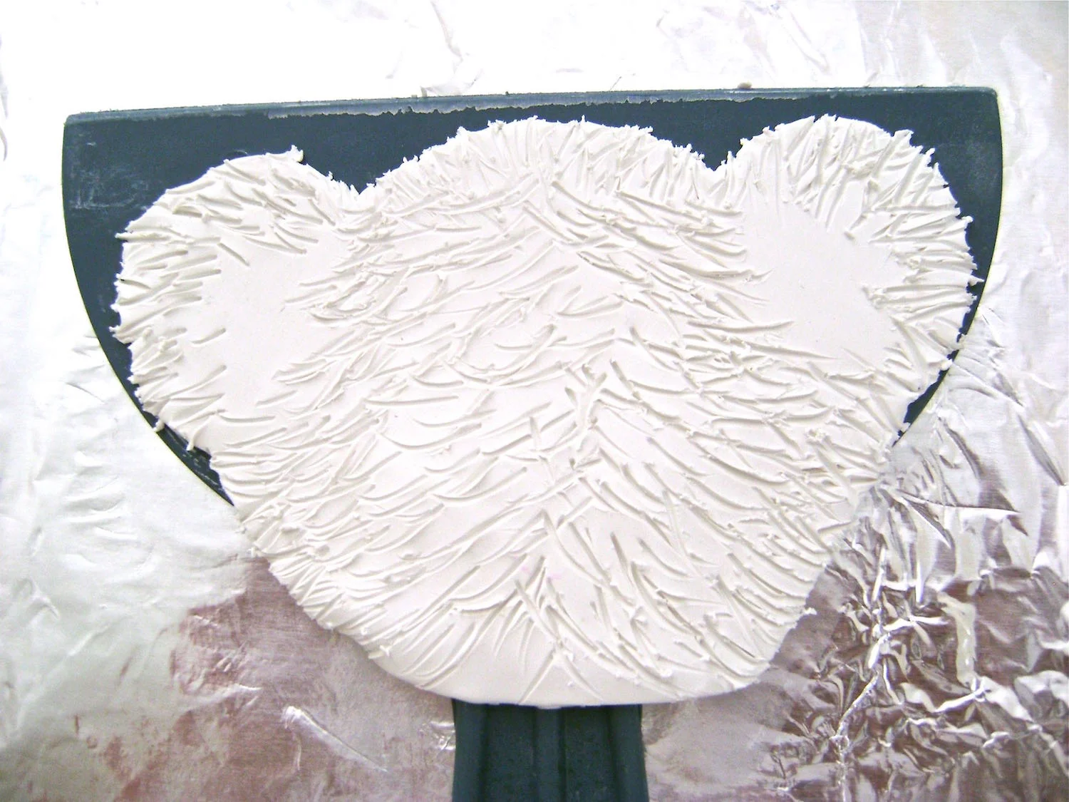 step 10 - Add texture to all of the head except the inside of the ears.