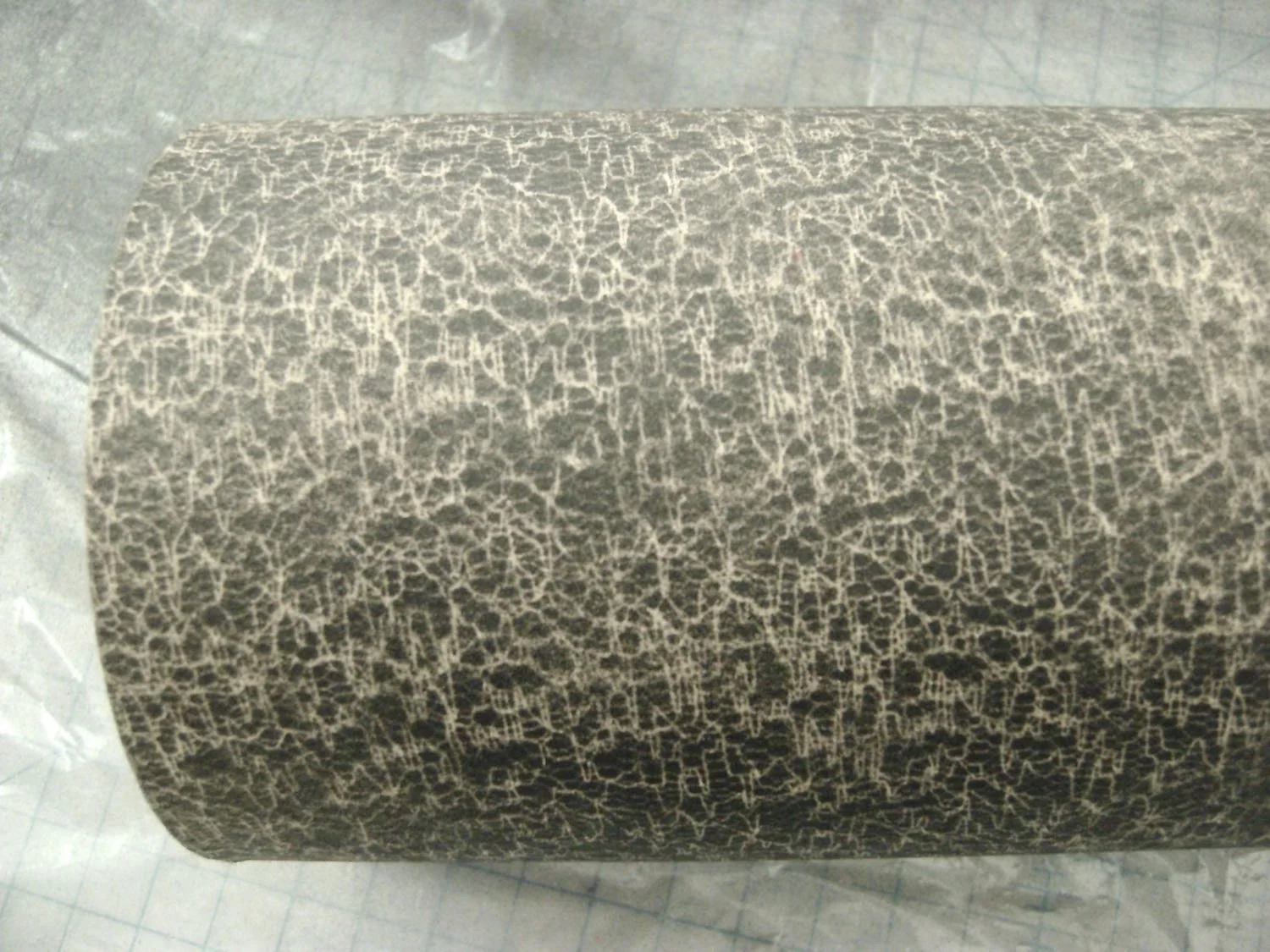 step 4 - Airbrush the entire box with black paint. When you remove the fabric it will have produced an interesting design.